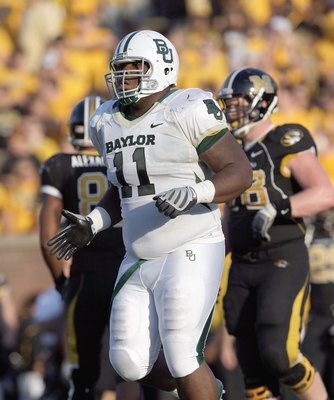 COLUMBIA, MO - NOVEMBER 7: Phil Taylor #11 of the Baylor Bears moves on the field during the game against the Missouri Tigers at Faurot Field at Memorial Stadium on November 7, 2009 in Columbia, Missouri. (Photo by Jamie Squire/Getty Images)