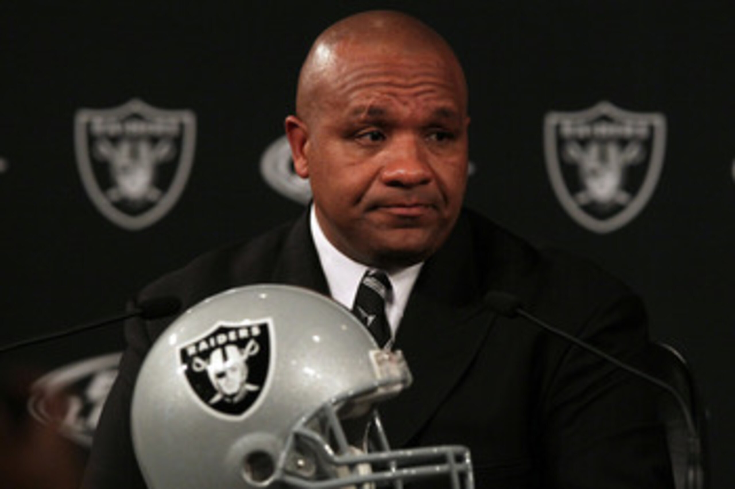 ALAMEDA, CA - JANUARY 18:  New Oakland Raiders coach Hue Jackson pauses as he speaks to reporters during a press conference on January 18, 2011 in Alameda, California. Hue Jackson was introduced as the new coach of the Oakland Raiders, replacing the fired
