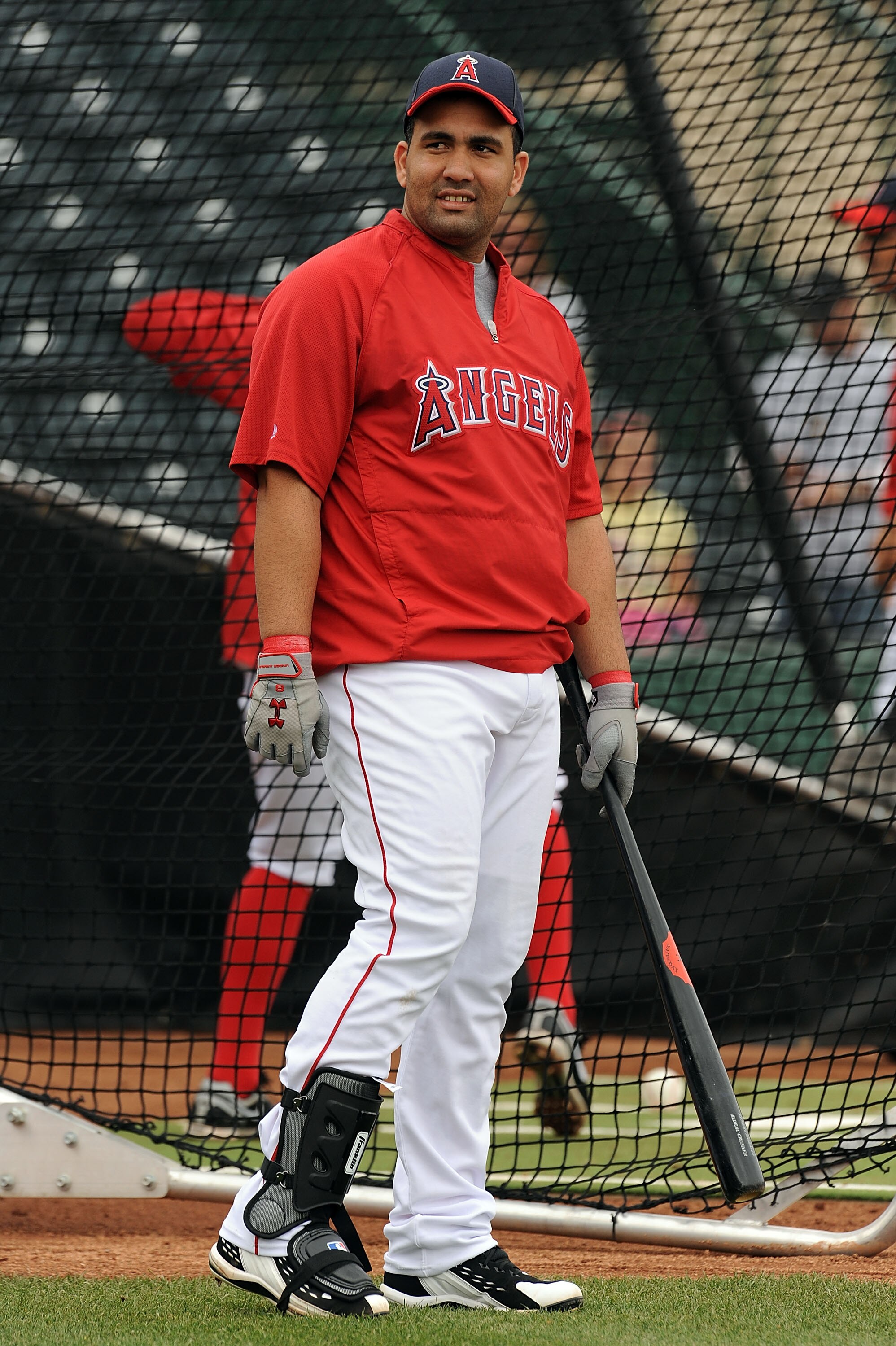 TEMPE, AZ - FEBRUARY 26:  Kendry Morales #8 of the Los Angeles Angels of Anaheim gets ready to take batting practice prior to the Los Angeles Dodgers game at Tempe Diablo Stadium on February 26, 2011 in Tempe, Arizona.  (Photo by Norm Hall/Getty Images)