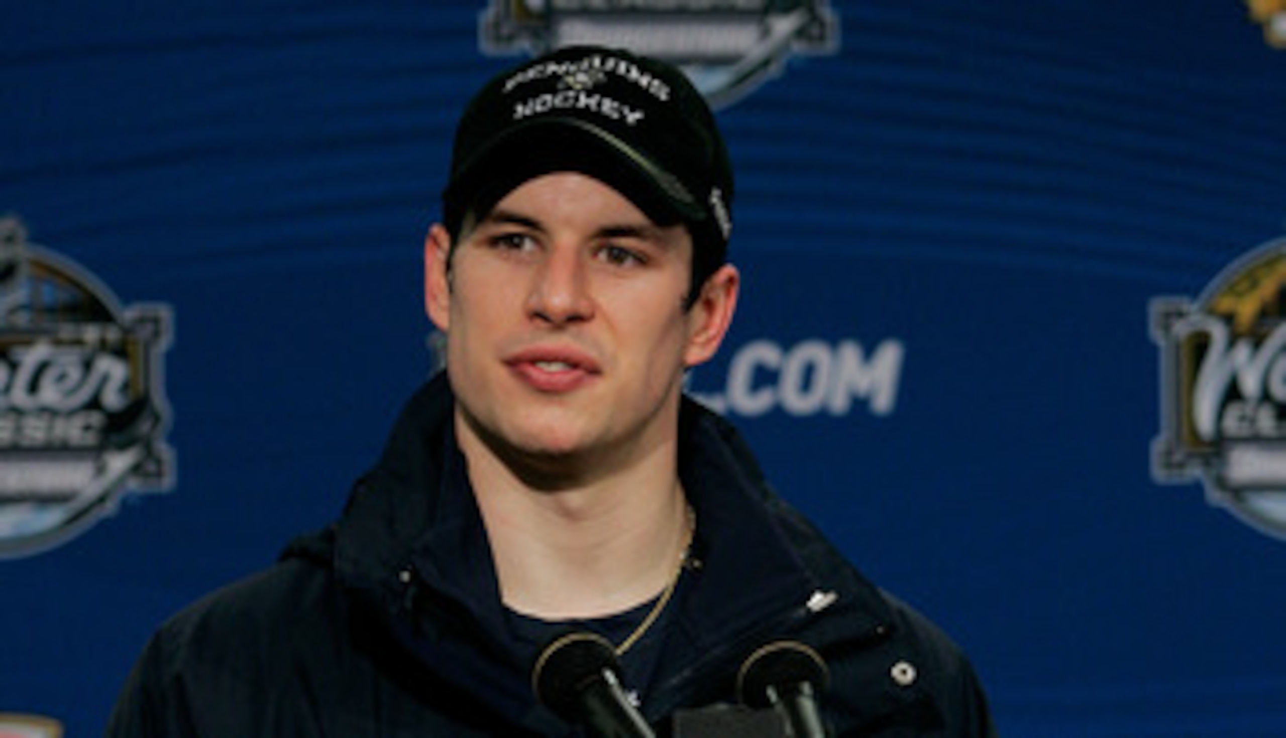 PITTSBURGH, PA - JANUARY 01: Sidney Crosby #87 of the Pittsburgh Penguins talks to the media during a press conference after losing 3-1 to the Washington Capitals during the 2011 NHL Bridgestone Winter Classic at Heinz Field on January 1, 2011 in Pittsbur PITTSBURGH, PA - JANUARY 01: Sidney Crosby #87 of the Pittsburgh Penguins talks to the media during a press conference after losing 3-1 to the Washington Capitals during the 2011 NHL Bridgestone Winter Classic at Heinz Field on January 1, 2011 in Pittsbur