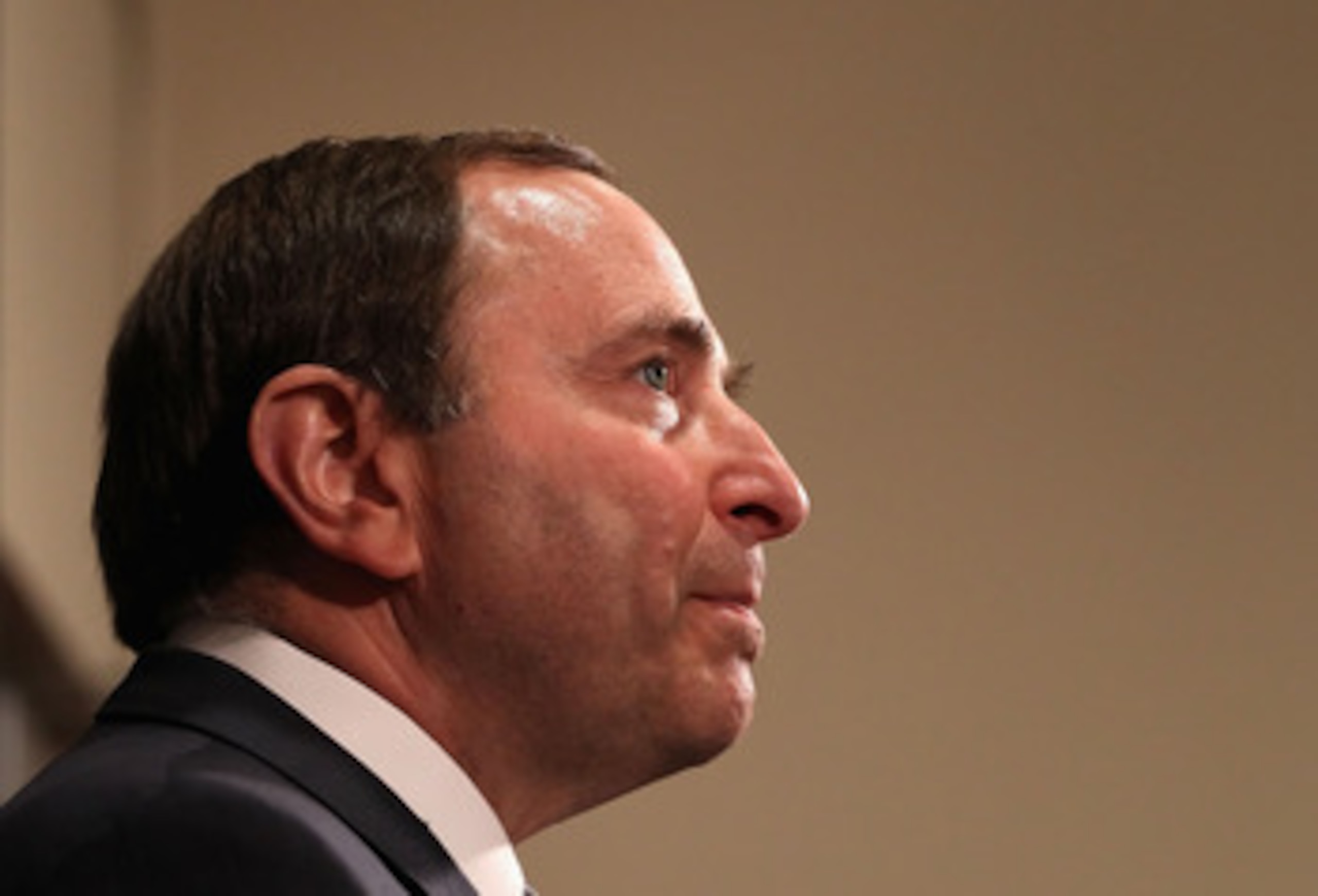 GLENDALE, AZ - MARCH 08: NHL commissioner Gary Bettman speaks during a press conference before the NHL game between the Vancouver Canucks and the Phoenix Coyotes at Jobing.com Arena on March 8, 2011 in Glendale, Arizona. (Photo by Christian Petersen/Get GLENDALE, AZ - MARCH 08: NHL commissioner Gary Bettman speaks during a press conference before the NHL game between the Vancouver Canucks and the Phoenix Coyotes at Jobing.com Arena on March 8, 2011 in Glendale, Arizona. (Photo by Christian Petersen/Get