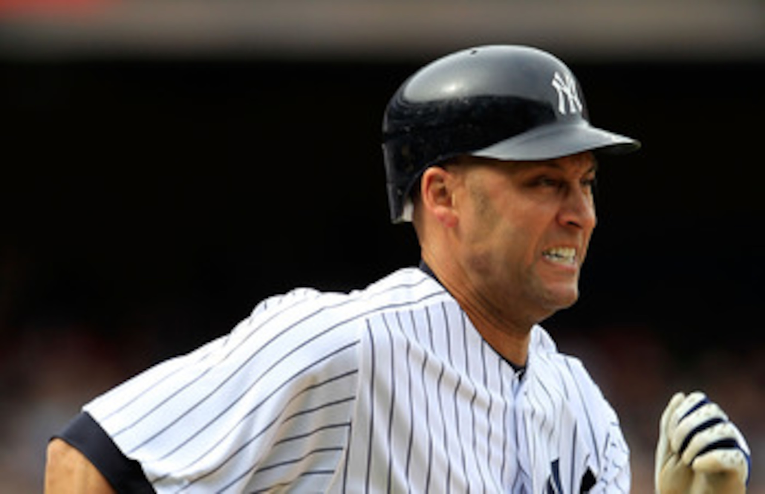 NEW YORK, NY - MAY 01: Derek Jeter #2 of the New York Yankees runs to first base against the Toronto Blue Jays at Yankee Stadium on May 1, 2011 in the Bronx borough of New York City. The Yankees defeated the  Blue Jays 5-2.  (Photo by Chris Trotman/Getty