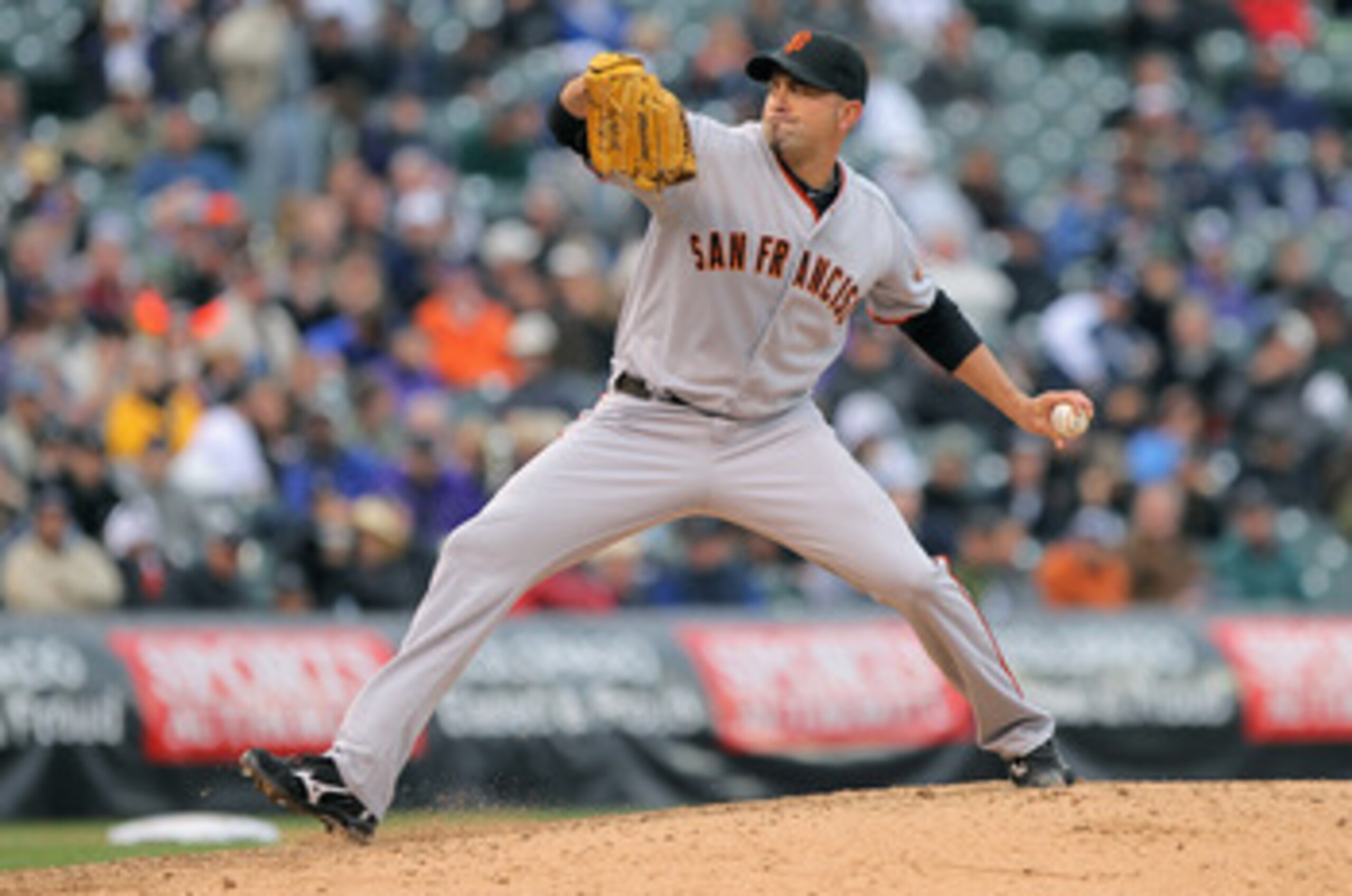 DENVER, CO - APRIL 20:  Relief pitcher Jeremy Affeldt #41 of the San Francisco Giants delivers against the Colorado Rockies at Coors Field on April 20, 2011 in Denver, Colorado.  (Photo by Doug Pensinger/Getty Images)