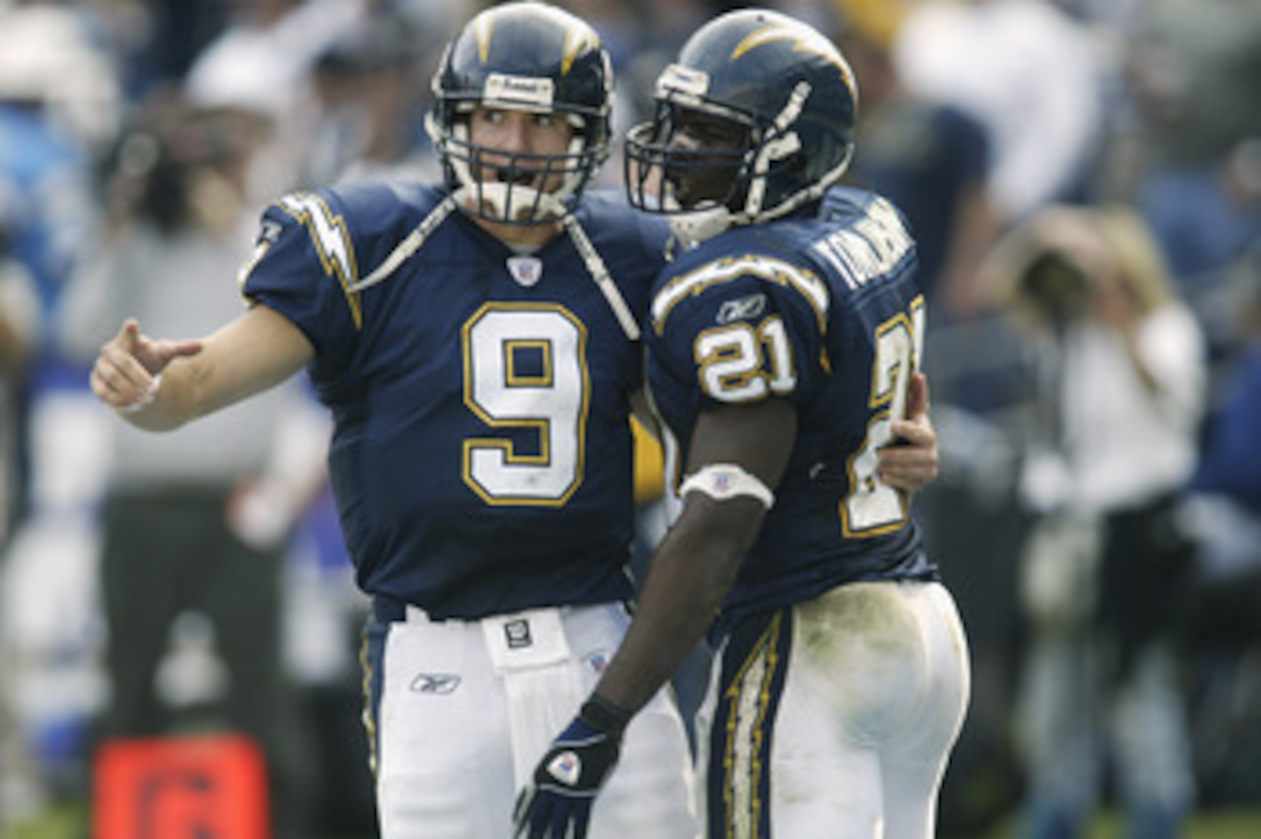 SAN DIEGO - DECEMBER 1:  Drew Brees #9 of the San Diego Chargers congratulates LaDainian Tomlinson #21 after Tomlinson's third touchdown of the first half of the  game versus the Denver Broncos on December 1, 2002 at Qualcomm Stadium in San Diego, Califor