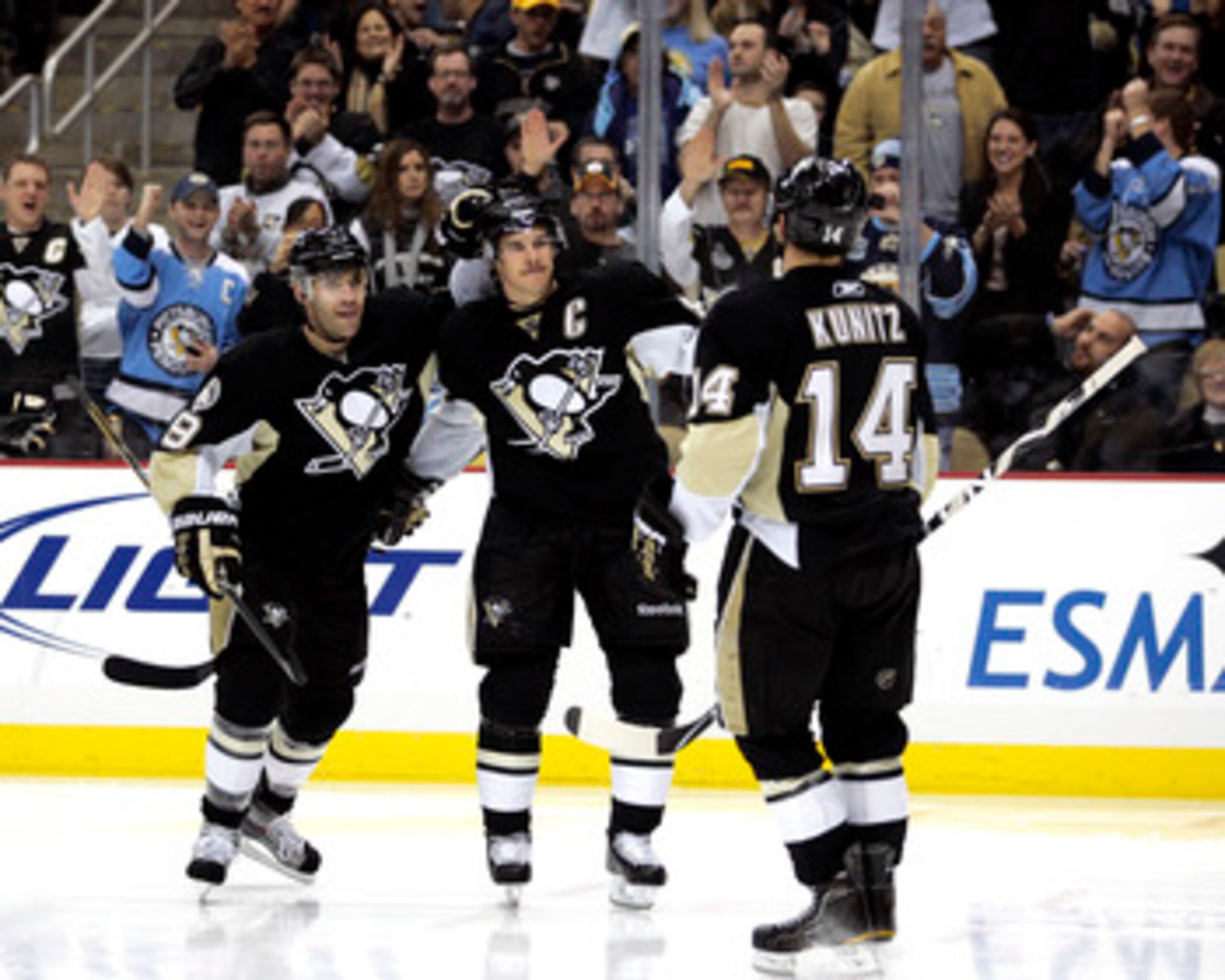 PITTSBURGH, PA - DECEMBER 28: Chris Kunitz #14 of the Pittsburgh Penguins celebrates his third period goal with teammates Sidney Crosby #87 and Pascal Dupuis #9 against the Atlanta Thrashers at Consol Energy Center on December 28, 2010 in Pittsburgh, Pen PITTSBURGH, PA - DECEMBER 28: Chris Kunitz #14 of the Pittsburgh Penguins celebrates his third period goal with teammates Sidney Crosby #87 and Pascal Dupuis #9 against the Atlanta Thrashers at Consol Energy Center on December 28, 2010 in Pittsburgh, Pen