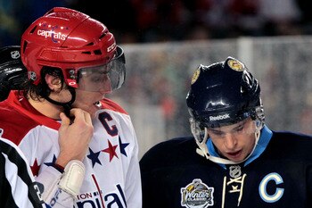 PITTSBURGH, PA - JANUARY 01:  Alex Ovechkin #8 of the Washington Capitals and Sidney Crosby #81 of the Pittsburgh Penguins are seen during the 2011 NHL Bridgestone Winter Classic at Heinz Field on January 1, 2011 in Pittsburgh, Pennsylvania. Washington wo