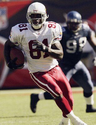 TEMPE, AZ - SEPTEMBER 14:   Wide receiver Anquan Boldin #81 of the Arizona Cardinals carries the ball against the Seattle Seahawks on September 14, 2003 at Sun Devil Stadium in Tempe, Arizona.  The Seahawks defeated the Cardinals 38-0.  (Photo by Stephen