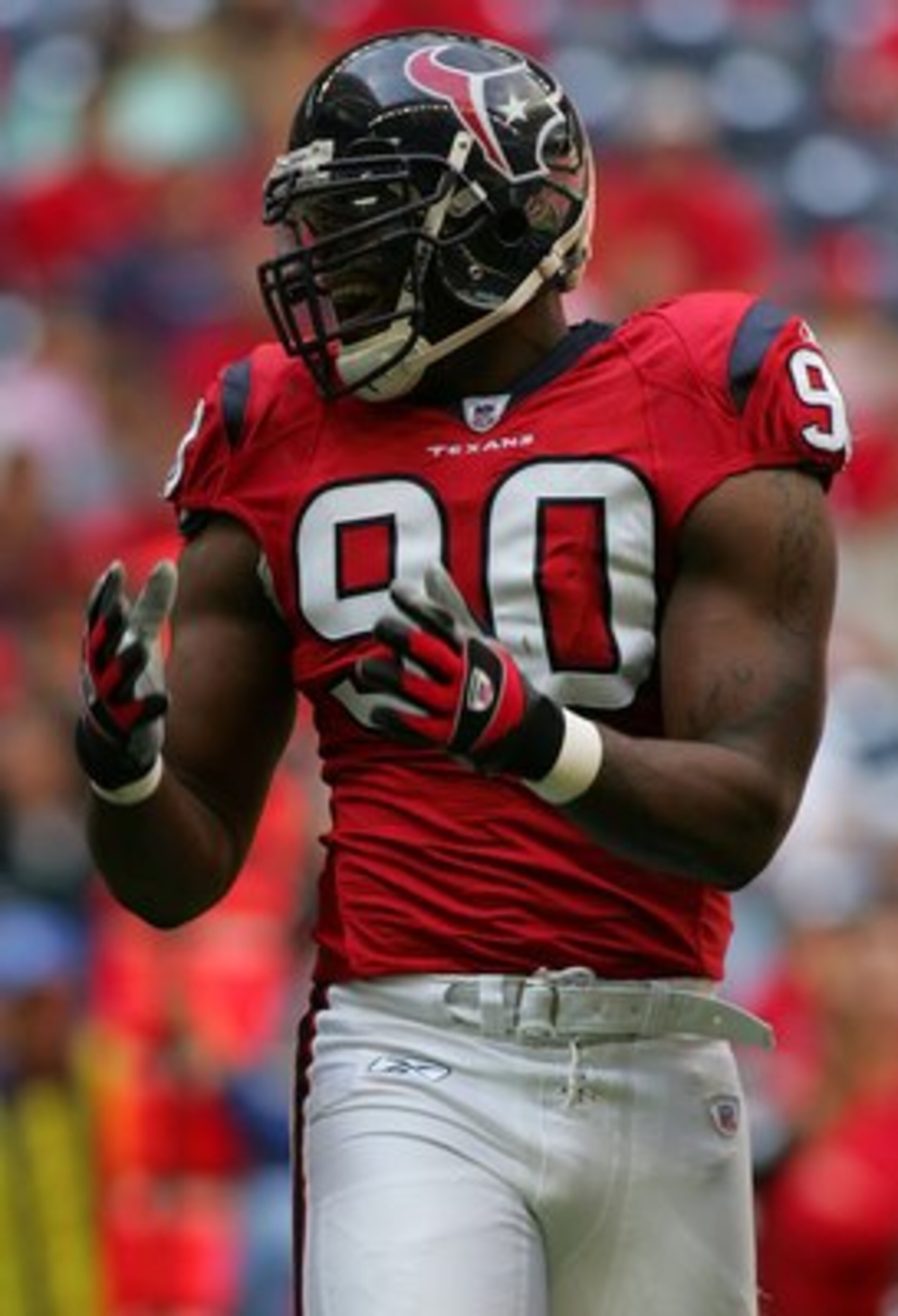 HOUSTON - OCTOBER 22:  Defensive end Mario Williams #90 of the Houston Texans during play against the Jacksonville Jaguars at Reliant Stadium on October 22, 2006 in Houston, Texas.  (Photo by Ronald Martinez/Getty Images)