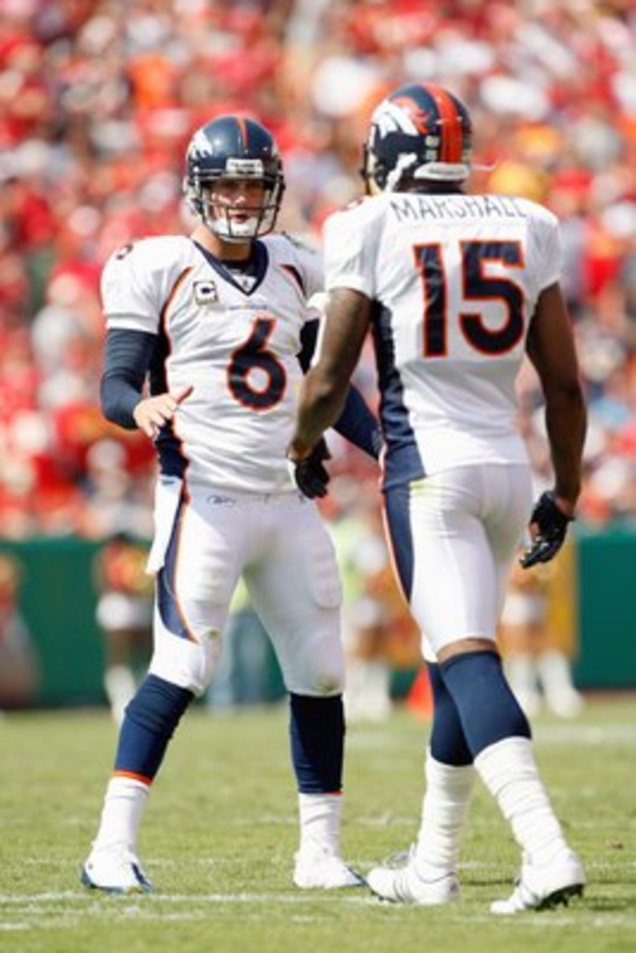 KANSAS CITY - SEPTEMBER 28:  Quarterback Jay Cutler #6 of the Denver Broncos looks to Brandon Marshall #15 during the game against the Kansas City Chiefs on September 28, 2008 at Arrowhead Stadium in Kansas City, Missouri. The Chiefs defeated the Broncos