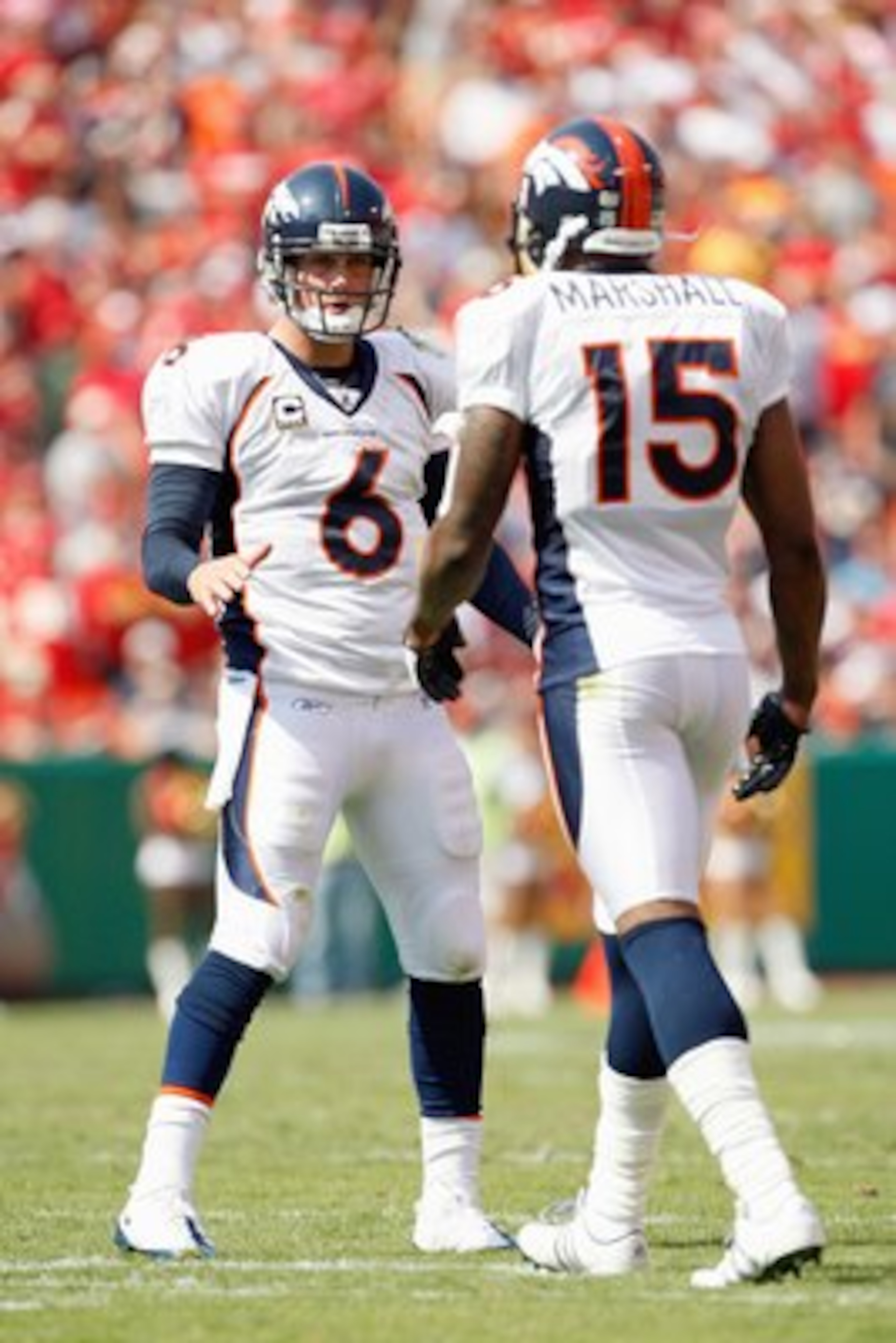 KANSAS CITY - SEPTEMBER 28:  Quarterback Jay Cutler #6 of the Denver Broncos looks to Brandon Marshall #15 during the game against the Kansas City Chiefs on September 28, 2008 at Arrowhead Stadium in Kansas City, Missouri. The Chiefs defeated the Broncos