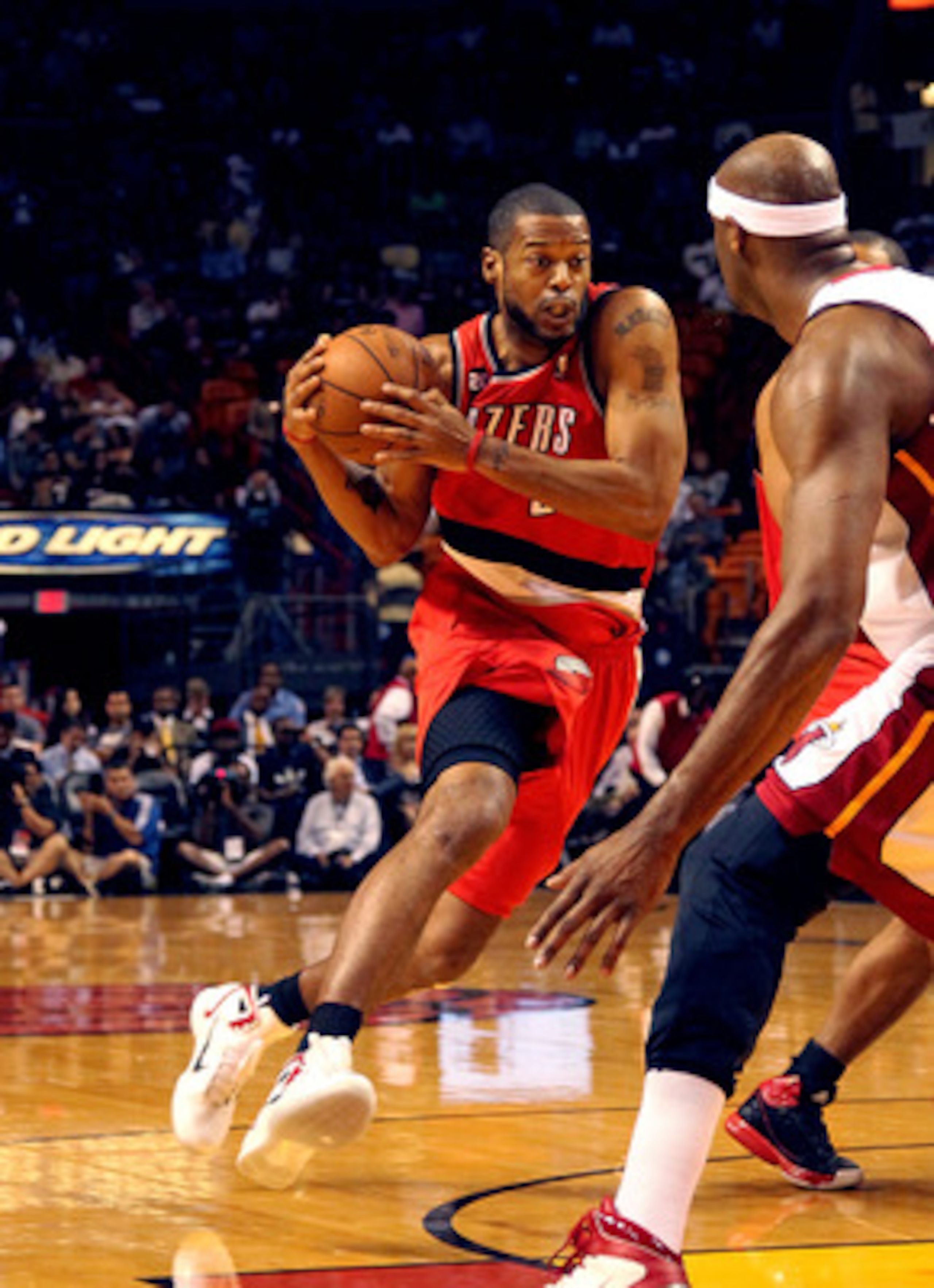 MIAMI, FL - MARCH 08:  Marcus Camby #23 of the Portland Trail Blazers drives to the basket during a game against the Miami Heat at American Airlines Arena on March 8, 2011 in Miami, Florida. NOTE TO USER: User expressly acknowledges and agrees that, by do