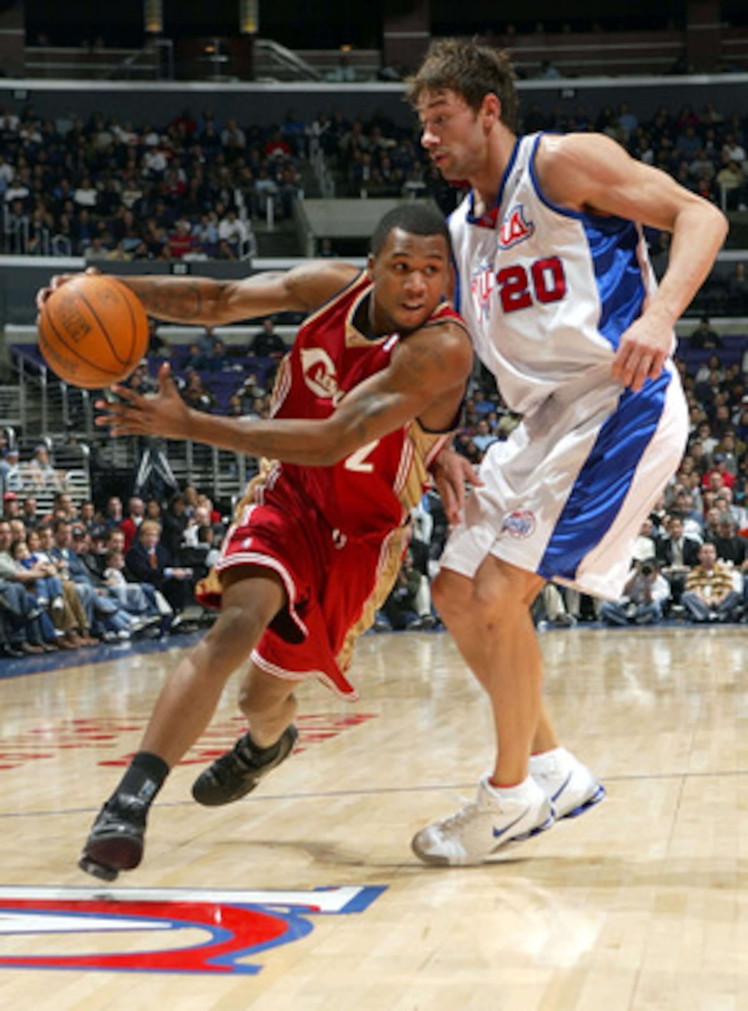 LOS ANGELES - NOVEMBER 29:  Dajuan Wagner #2 of the Cleveland Cavaliers tries to get past Marko Jaric #20 of the Los Angeles Clippers in NBA action November 29, 2004 at Staples Center in Los Angeles, California. NOTE TO USER: User expressly acknowledges a