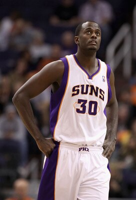 PHOENIX - DECEMBER 10:  Earl Barron #30 of the Phoenix Suns during the NBA game against the Portland Trail Blazers at US Airways Center on December 10, 2010 in Phoenix, Arizona. The Trail Blazers defeated the Suns 101-94.  NOTE TO USER: User expressly ack