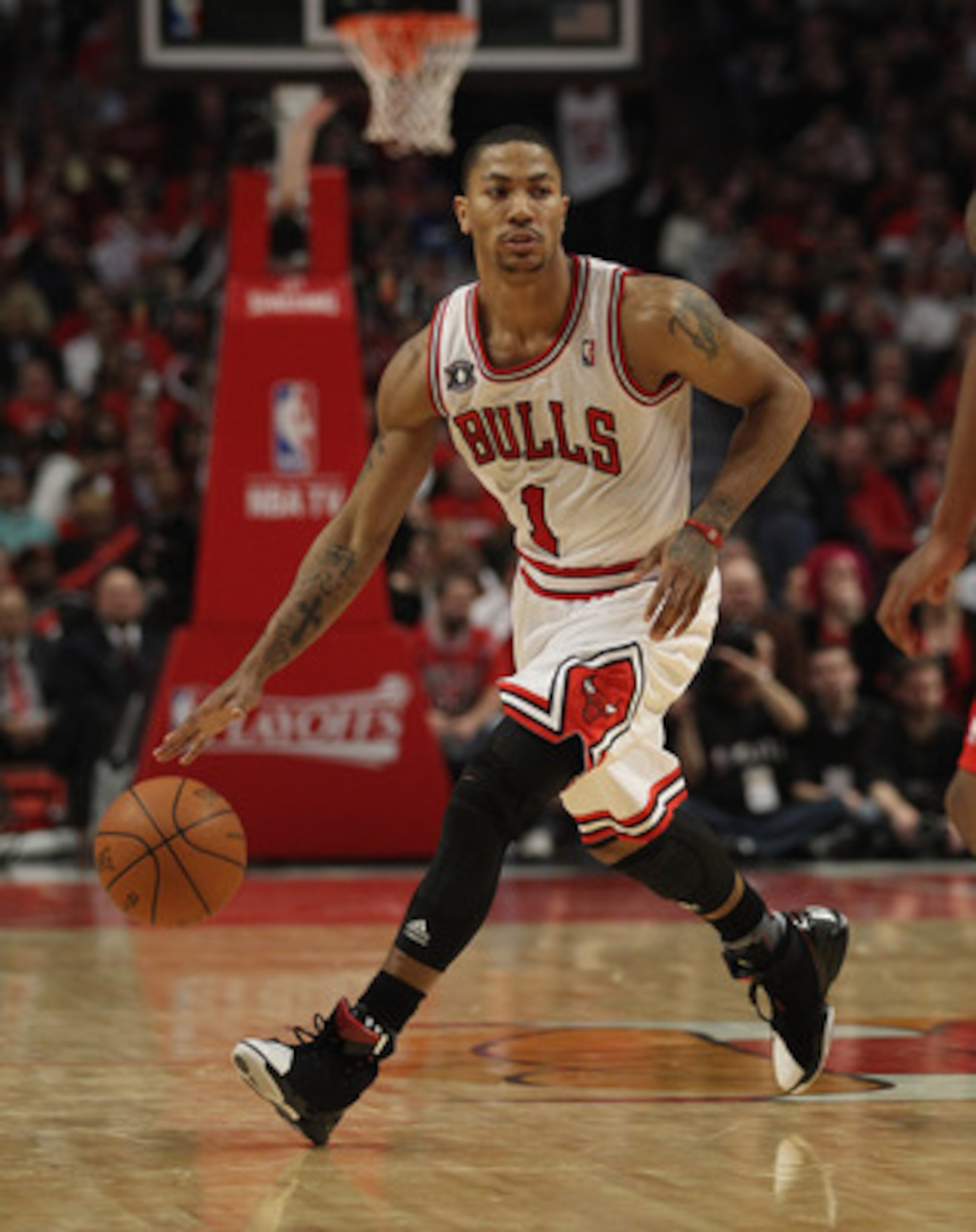 CHICAGO, IL - MAY 04: Derrick Rose #1 of the Chicago Bulls moves with the ball against the Atlanta Hawks in Game Two of the Eastern Conference Semifinals in the 2011 NBA Playoffs at the United Center on May 4, 2011 in Chicago, Illinois. The Bulls defeated