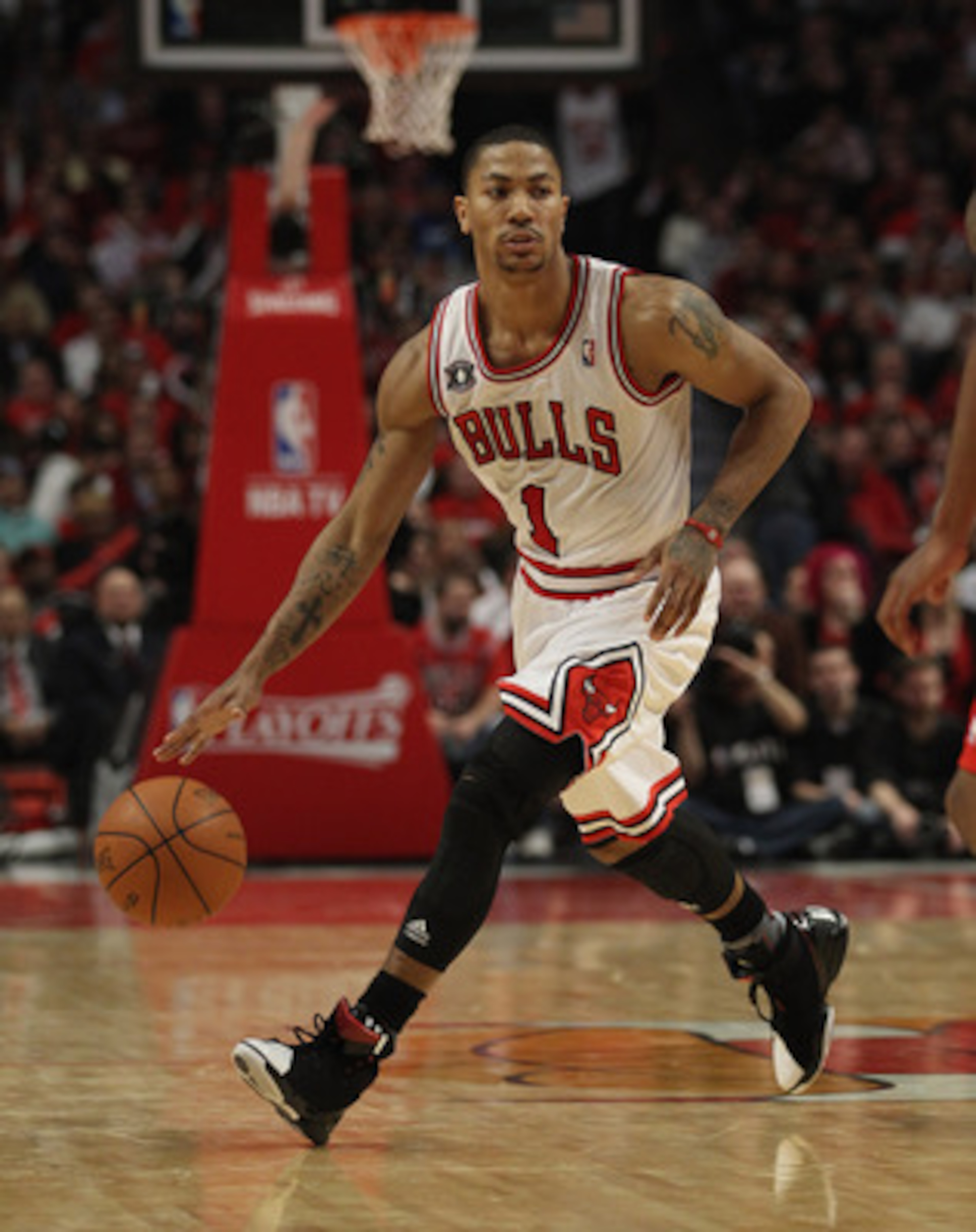 CHICAGO, IL - MAY 04: Derrick Rose #1 of the Chicago Bulls moves with the ball against the Atlanta Hawks in Game Two of the Eastern Conference Semifinals in the 2011 NBA Playoffs at the United Center on May 4, 2011 in Chicago, Illinois. The Bulls defeated CHICAGO, IL - MAY 04: Derrick Rose #1 of the Chicago Bulls moves with the ball against the Atlanta Hawks in Game Two of the Eastern Conference Semifinals in the 2011 NBA Playoffs at the United Center on May 4, 2011 in Chicago, Illinois. The Bulls defeated