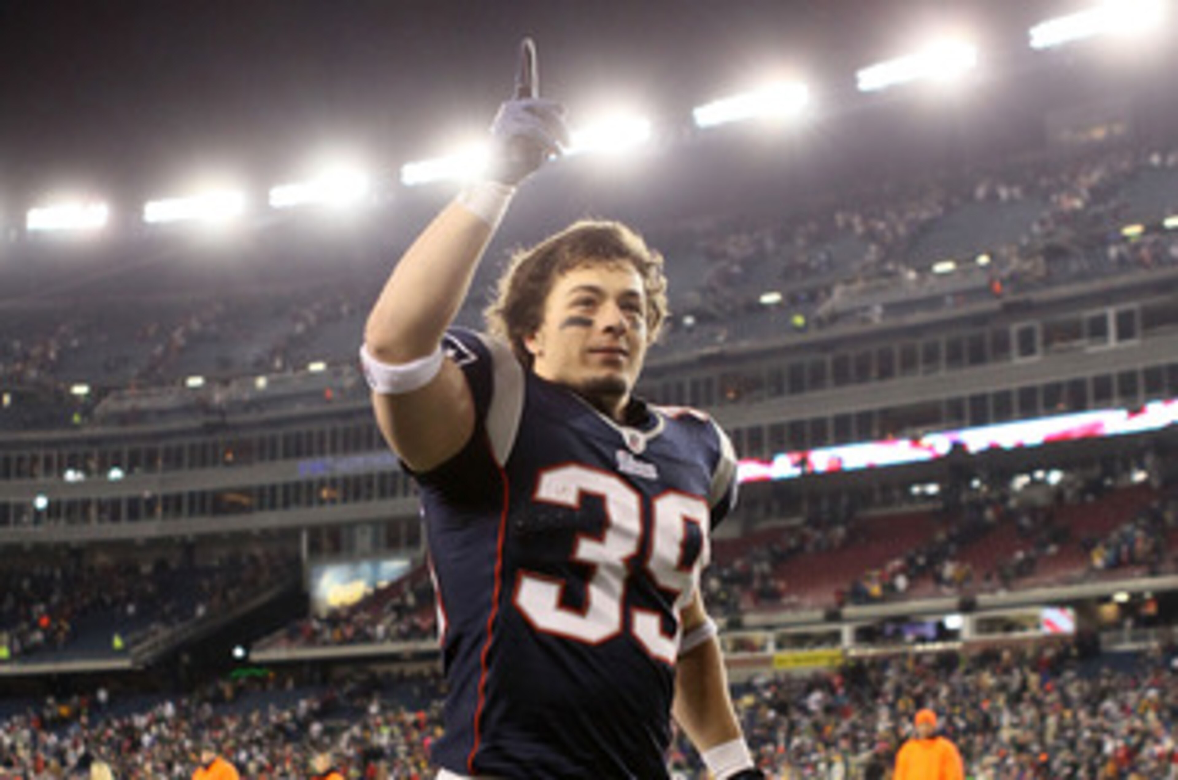 FOXBORO, MA - DECEMBER 19:  Running back Danny Woodhead #39 of the New England Patriots celebrates as he runs off the field after defeating the Green Bay Packers 31-27 at Gillette Stadium on December 19, 2010 in Foxboro, Massachusetts.  (Photo by Elsa/Get