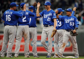 MINNEAPOLIS, MN - APRIL 13: Jeff Francoeur #21 and Melky Cabrera #53 of the Kansas City Royals celebrate a 10-5 win against the Minnesota Twins following their game on April 13, 2011 at Target Field in Minneapolis, Minnesota. Royals defeated the Twins 10-
