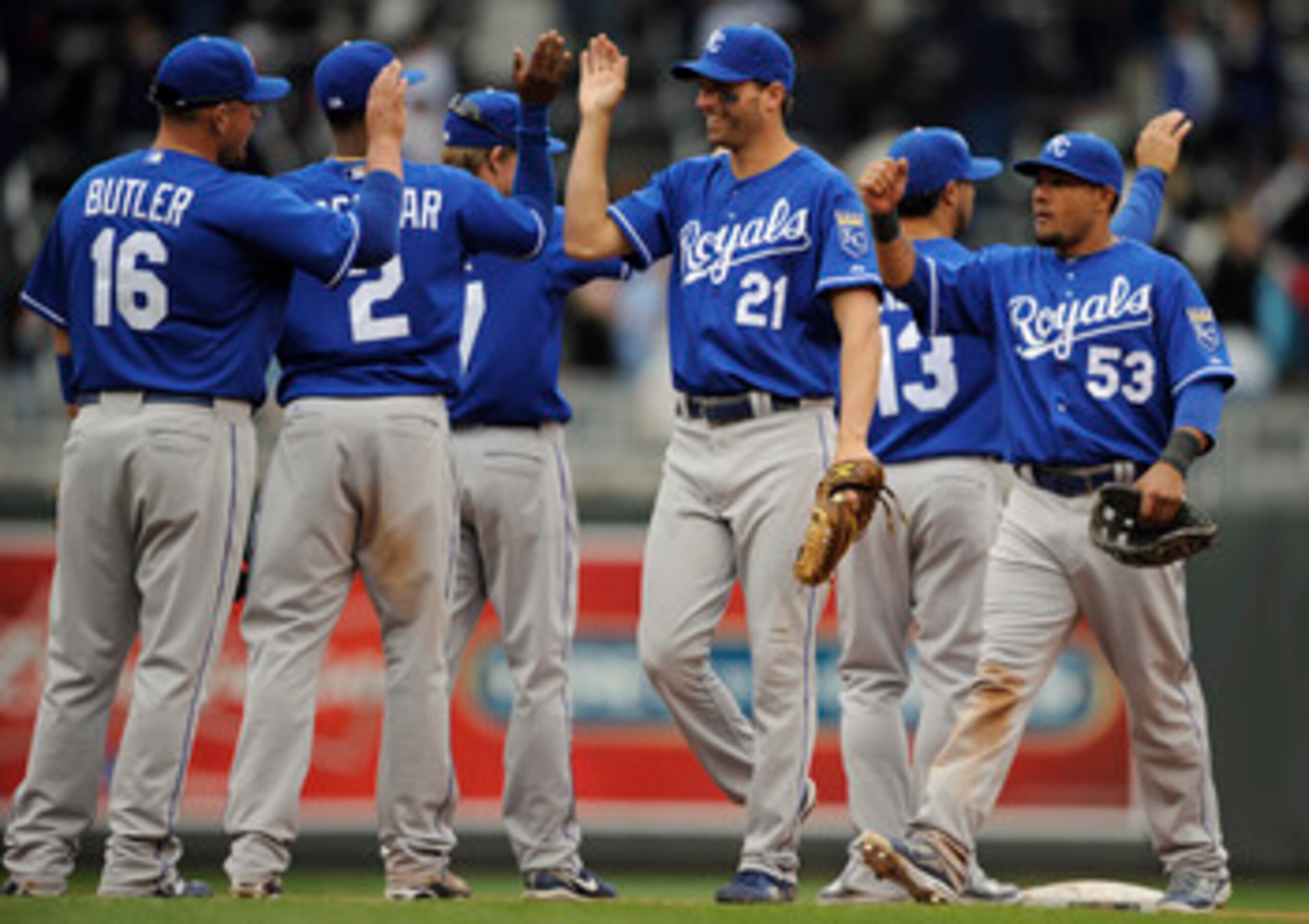 MINNEAPOLIS, MN - APRIL 13: Jeff Francoeur #21 and Melky Cabrera #53 of the Kansas City Royals celebrate a 10-5 win against the Minnesota Twins following their game on April 13, 2011 at Target Field in Minneapolis, Minnesota. Royals defeated the Twins 10- MINNEAPOLIS, MN - APRIL 13: Jeff Francoeur #21 and Melky Cabrera #53 of the Kansas City Royals celebrate a 10-5 win against the Minnesota Twins following their game on April 13, 2011 at Target Field in Minneapolis, Minnesota. Royals defeated the Twins 10-