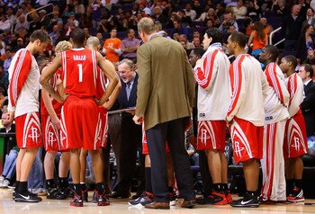 PHOENIX - JANUARY 06:  Head coach Rick Adelman of the Houston Rockets directs his team during a time out from the NBA game against the Phoenix Suns at US Airways Center on January 6, 2010 in Phoenix, Arizona.  The Suns defeated the Rockets 118-110.  NOTE 