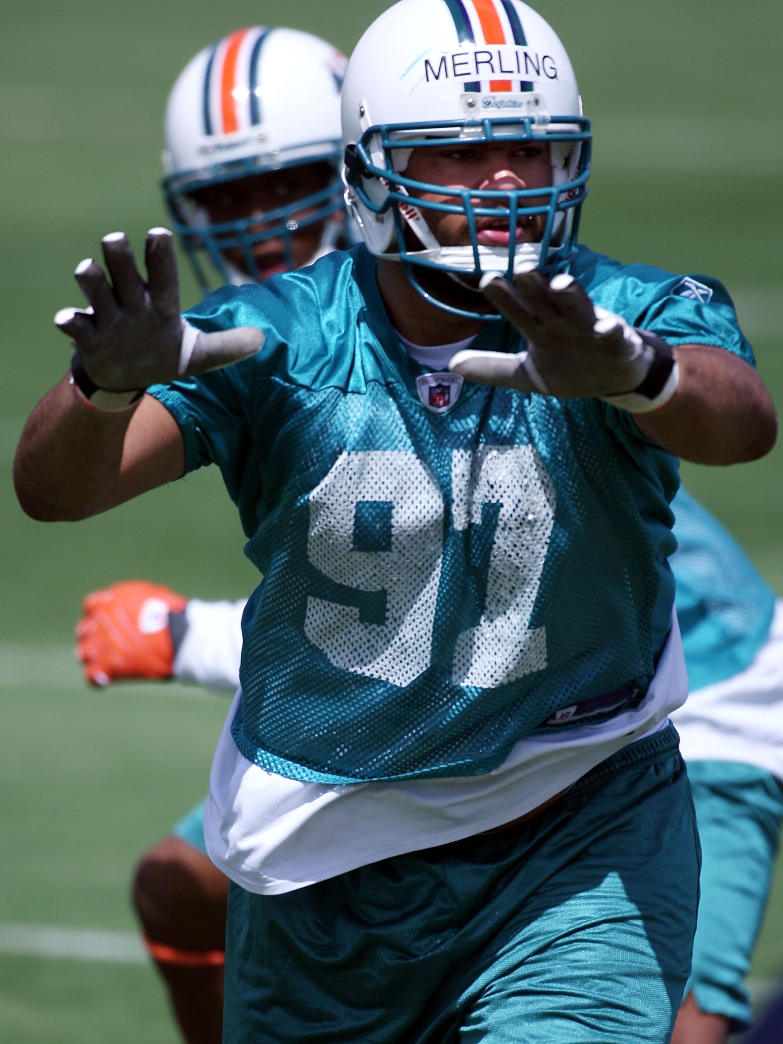 DAVIE, FL - JUNE 06: Rookie defensive end Phillip Merling #97 during practice on during Miami Dolphins Mini Camp on May 2, 2008 at the Dolphins practice facility in Davie, Florida.   (Photo by Marc Serota/Getty Images)