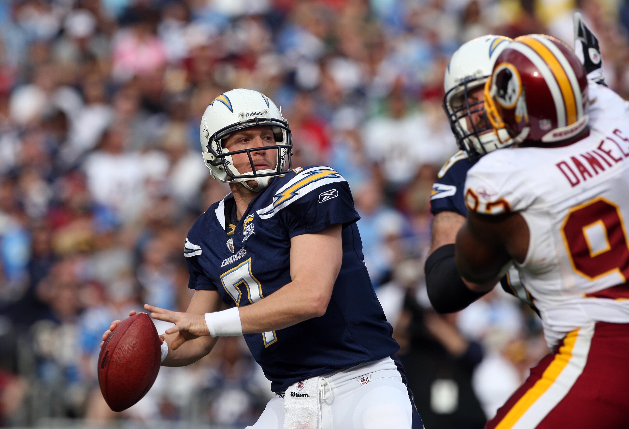 SAN DIEGO, CA - JANUARY 3:  Back-up Quarterback Billy Volek #7 of the San Diego Chargers throws against the Washington Redskins on January 3, 2010 at Quolcomm Stadium in San Diego, California. (Photo by Donald Miralle/Getty Images)