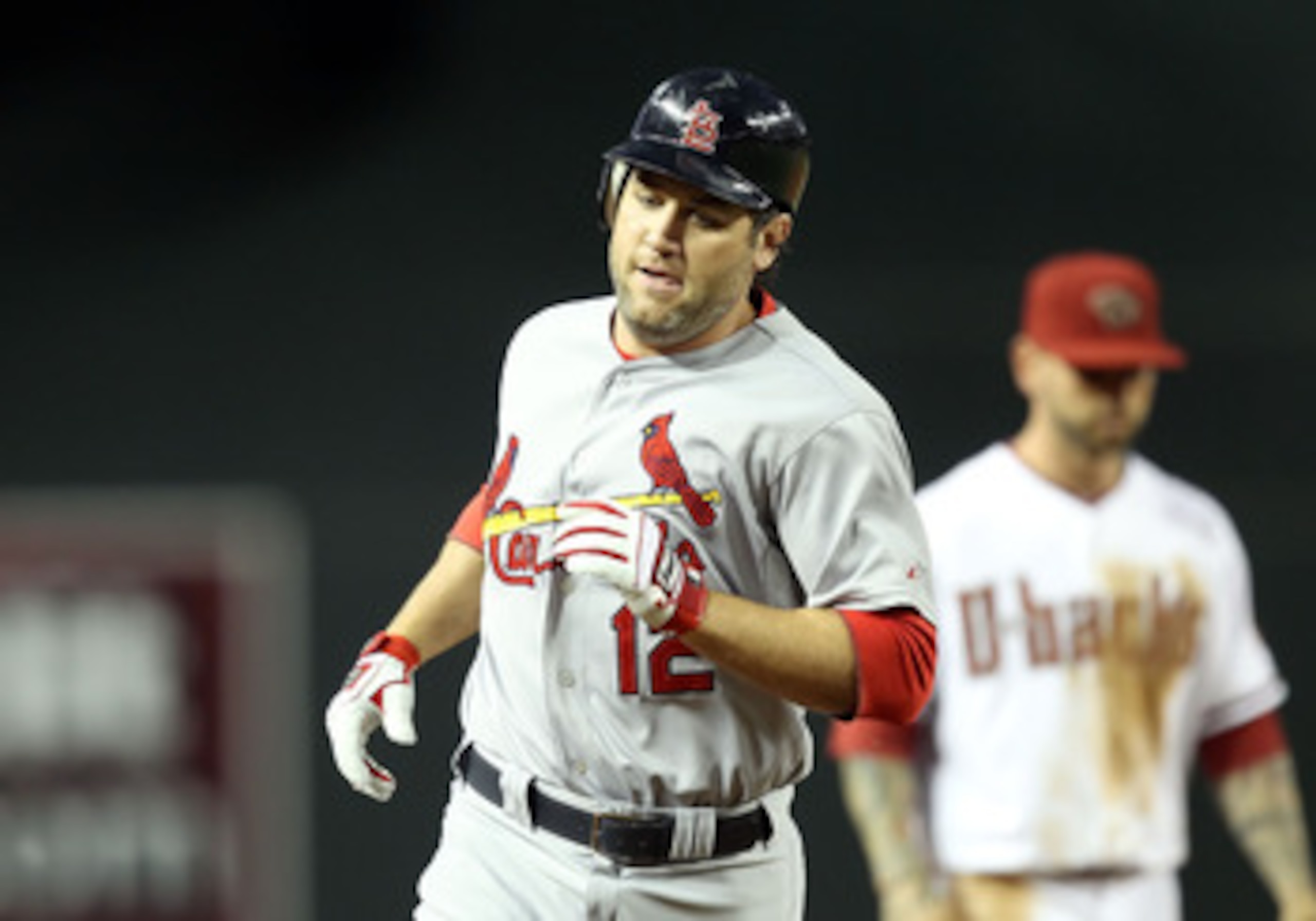 PHOENIX, AZ - APRIL 12: Lance Berkman #12 of the St. Louis Cardinals rounds the bases after hitting a solo home run against the Arizona Diamondbacks during the second inning of the Major League Baseball game at Chase Field on April 12, 2011 in Phoenix, A PHOENIX, AZ - APRIL 12: Lance Berkman #12 of the St. Louis Cardinals rounds the bases after hitting a solo home run against the Arizona Diamondbacks during the second inning of the Major League Baseball game at Chase Field on April 12, 2011 in Phoenix, A