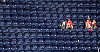 WASHINGTON, DC - APRIL 17:  Fans watch from the upper deck during a game between the Washington Nationals and the Milwaukee Brewers during the second game of a doubleheader at Nationals Park on April 17, 2011 in Washington, DC.  (Photo by Rob Carr/Getty I