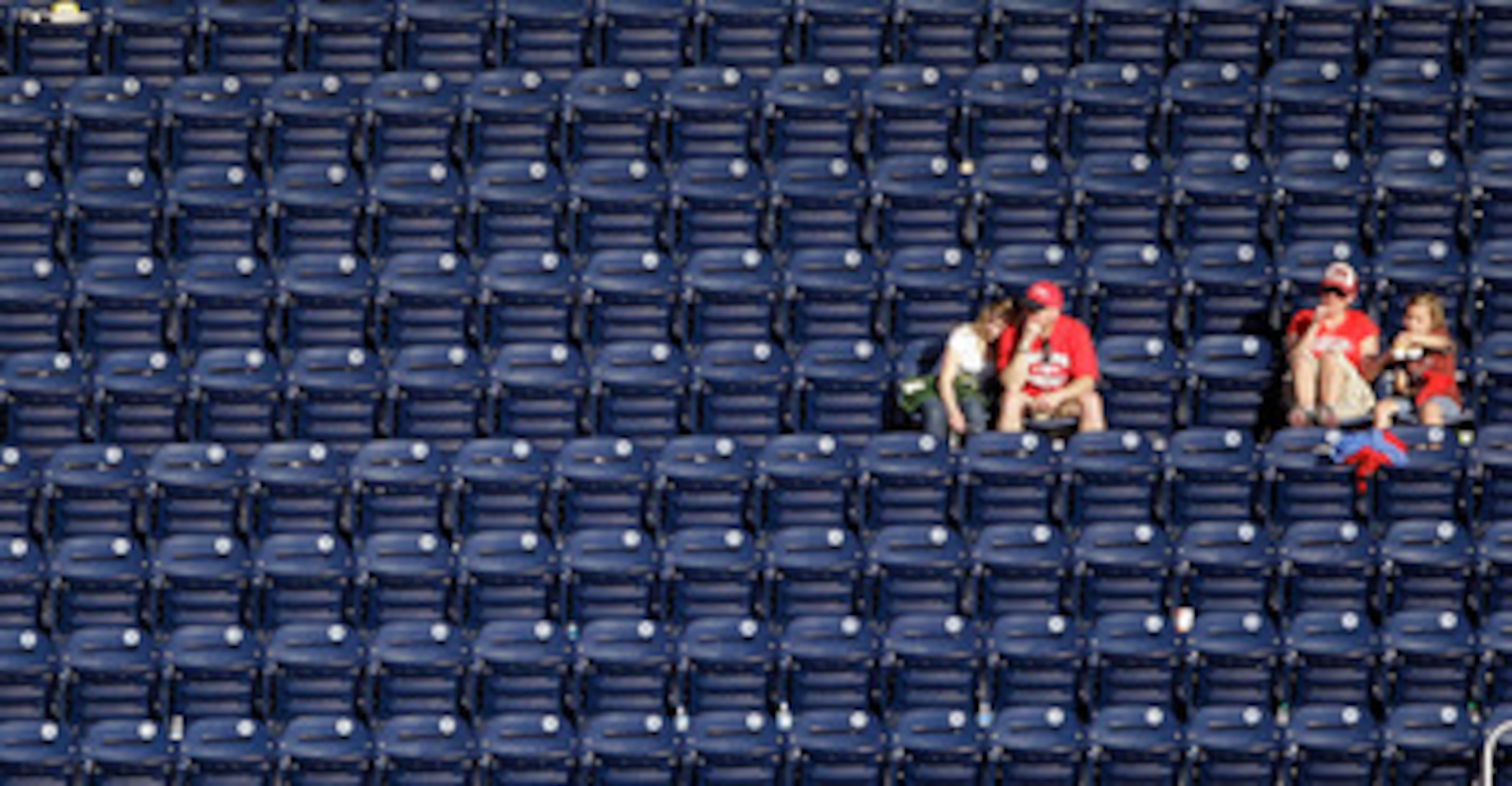 WASHINGTON, DC - APRIL 17:  Fans watch from the upper deck during a game between the Washington Nationals and the Milwaukee Brewers during the second game of a doubleheader at Nationals Park on April 17, 2011 in Washington, DC.  (Photo by Rob Carr/Getty I