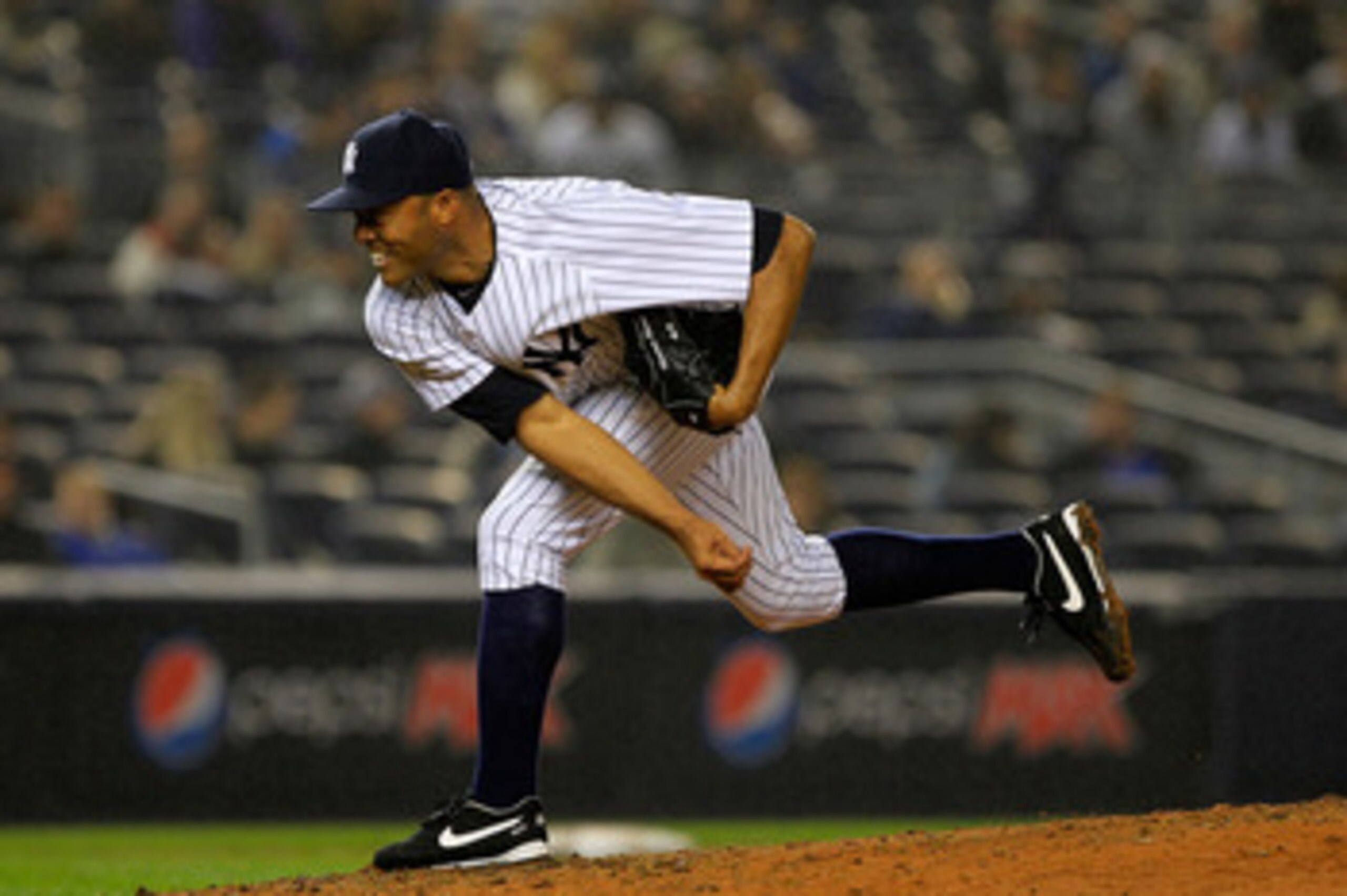 NEW YORK, NY - APRIL 13:  Mariano Rivera #42 of the New York Yankees pitches a save against the Baltimore Orioles at Yankee Stadium on April 13, 2011 in the Bronx borough of New York City. The Yankees defeated the Orioles 7-4.  (Photo by Chris Trotman/Get