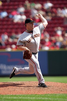 CINCINNATI - SEPTEMBER 6:  Pitcher Mike Stanton #38 of the San Francisco Giants delivers a pitch against the Cincinnati Reds during the game at the Great American Ball Park in Cincinnati, Ohio, on September 6, 2006. The Giants won 3-2.  (Photo by Andy Lyo