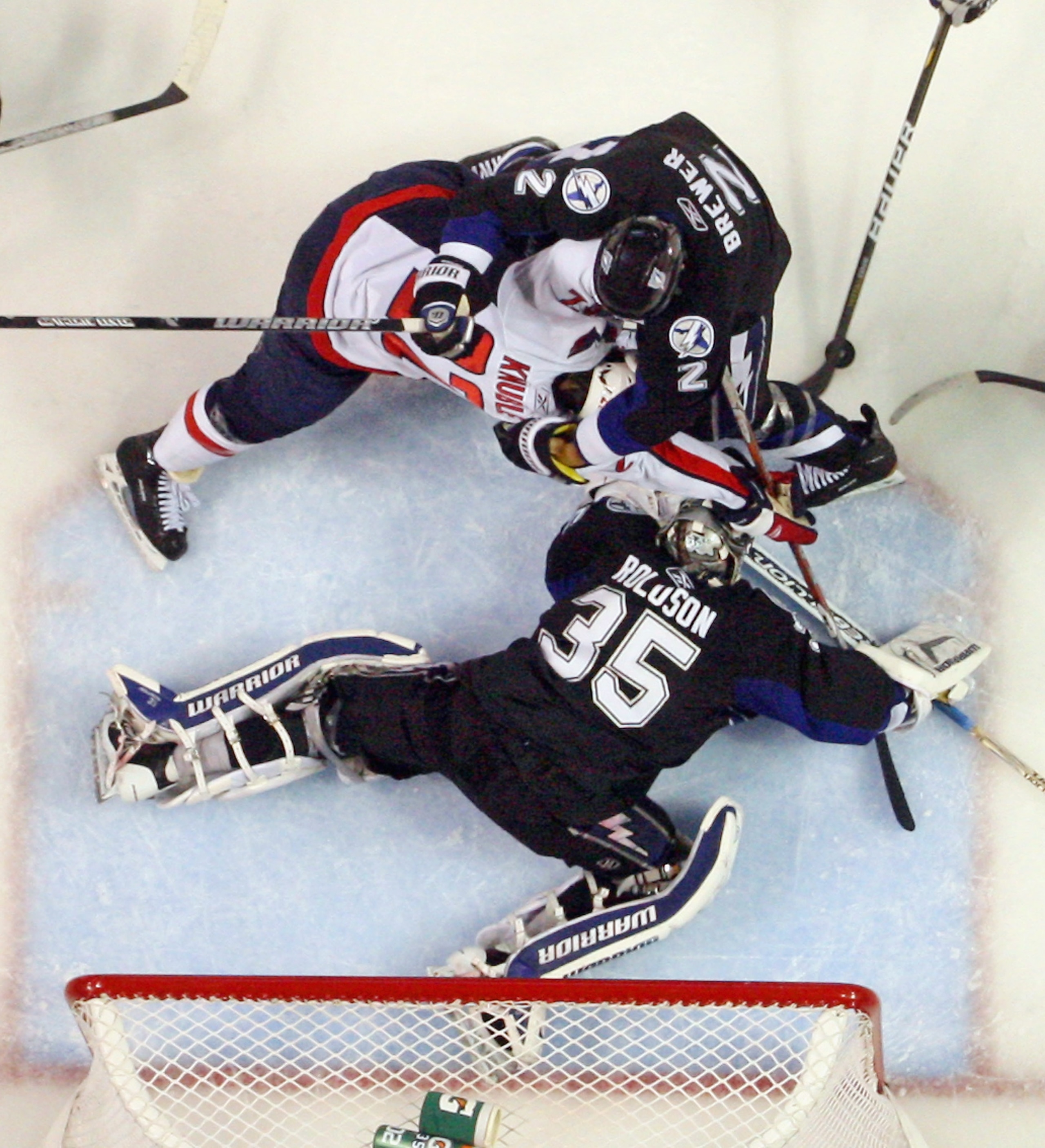 TAMPA, FL - MAY 03:  Dwayne Roloson #35 of the Tampa Bay Lightning defends the net against the Washington Capitals in Game Three of the Eastern Conference Semifinals during the 2011 NHL Stanley Cup Playoffs at St Pete Times Forum on May 3, 2011 in Tampa,