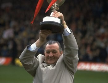 1983:  Bob Paisley Manager of Liverpool holds aloft the League Championship trophy after the final League game at Anfield in Liverpool, England. \ Mandatory Credit: Mike  Powell/Allsport
