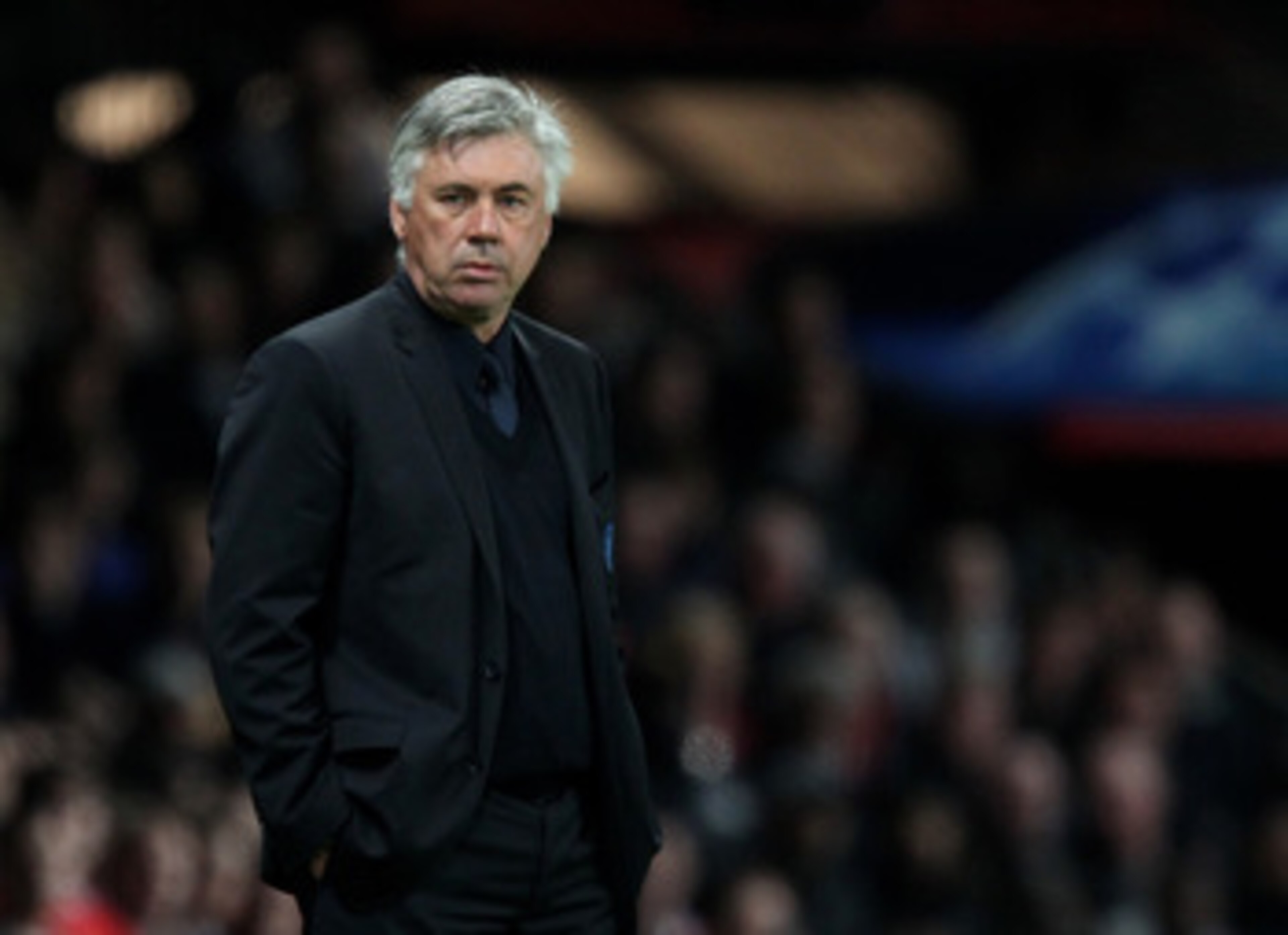 MANCHESTER, ENGLAND - APRIL 12: Chelsea Manager Carlo Ancelotti looks on during the UEFA Champions League Quarter Final second leg match between Manchester United and Chelsea at Old Trafford on April 12, 2011 in Manchester, United Kingdom. (Photo by Ale MANCHESTER, ENGLAND - APRIL 12: Chelsea Manager Carlo Ancelotti looks on during the UEFA Champions League Quarter Final second leg match between Manchester United and Chelsea at Old Trafford on April 12, 2011 in Manchester, United Kingdom. (Photo by Ale