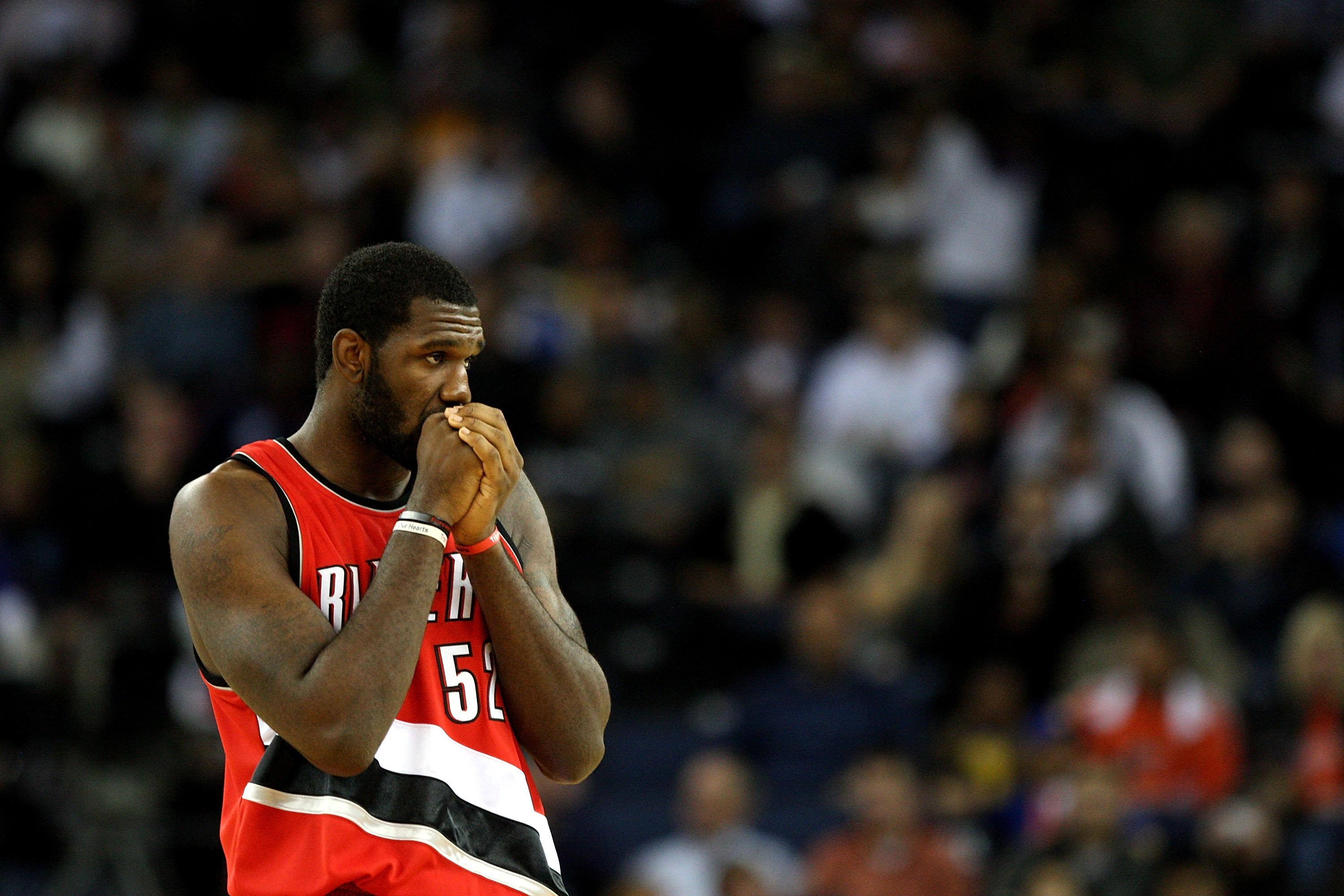 OAKLAND, CA - NOVEMBER 20:  Greg Oden #52 of the Portland Trail Blazers looks on against the Golden State Warriors during an NBA game at Oracle Arena on November 20, 2009 in Oakland, California.  (Photo by Jed Jacobsohn/Getty Images)