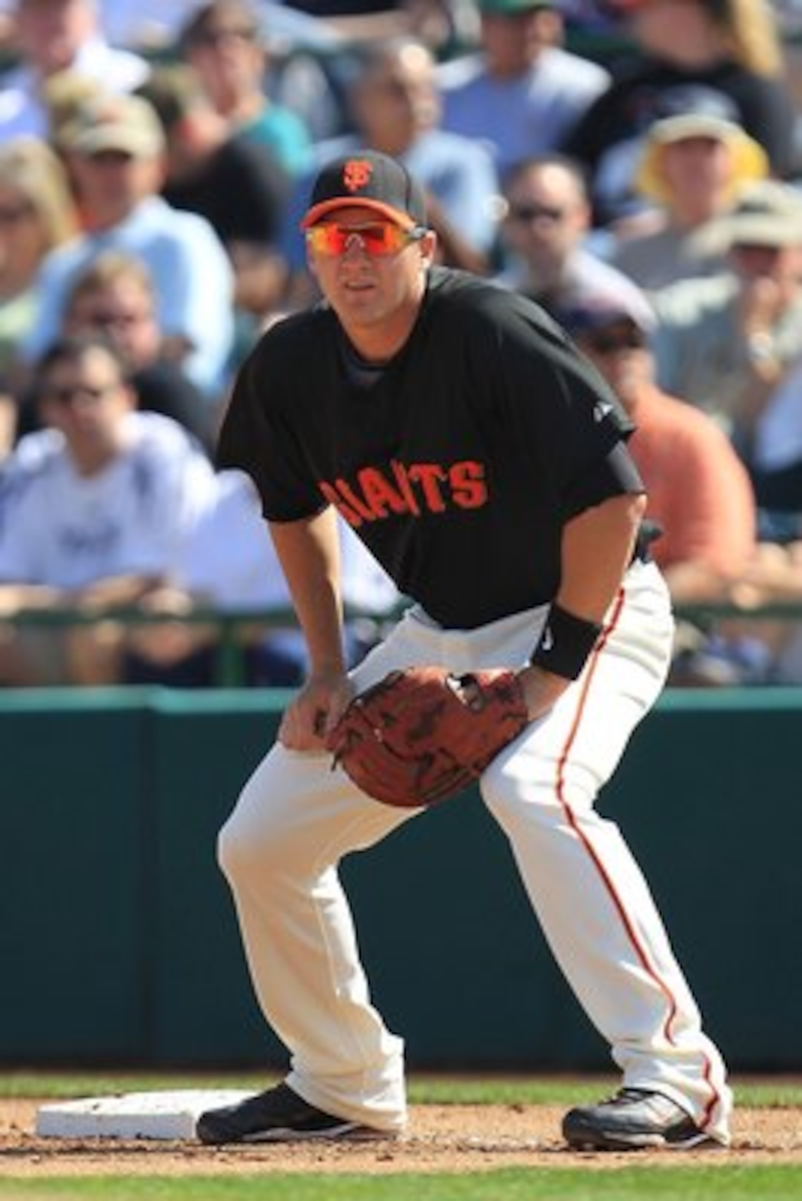 SCOTTSDALE, AZ - MARCH 04:  Brett Pill #35 of the San Francisco Giants fields against the Milwaukee Brewers during a spring training game at Scottsdale Stadium on March 4, 2010 in Scottsdale, Arizona.  (Photo by Chris McGrath/Getty Images)