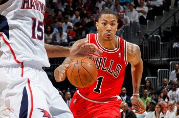 ATLANTA, GA - MAY 06:  Derrick Rose #1 of the Chicago Bulls drives against Al Horford #15 of the Atlanta Hawks in Game Three of the Eastern Conference Semifinals in the 2011 NBA Playoffs at Phillips Arena on May 6, 2011 in Atlanta, Georgia.  NOTE TO USER: