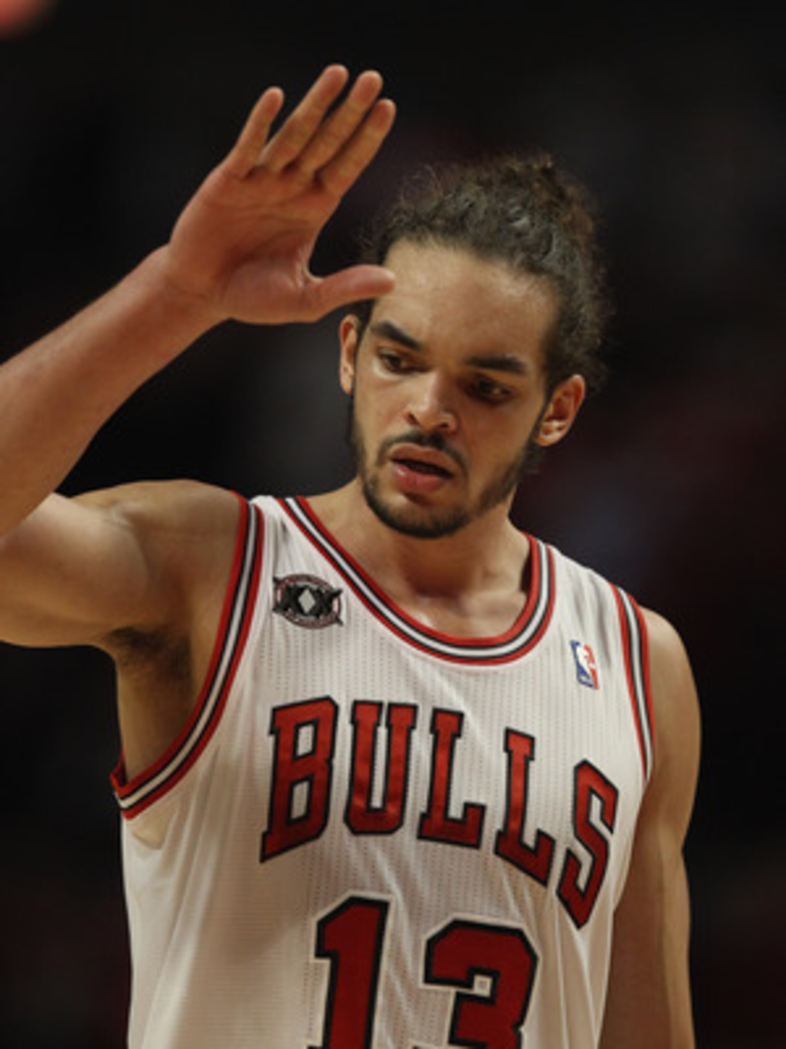 CHICAGO, IL - MAY 04: Joakim Noah #13 of the Chicago Bulls celebrates a win over the Atlanta Hawks in Game Two of the Eastern Conference Semifinals in the 2011 NBA Playoffs at the United Center on May 4, 2011 in Chicago, Illinois. The Bulls defeated the H