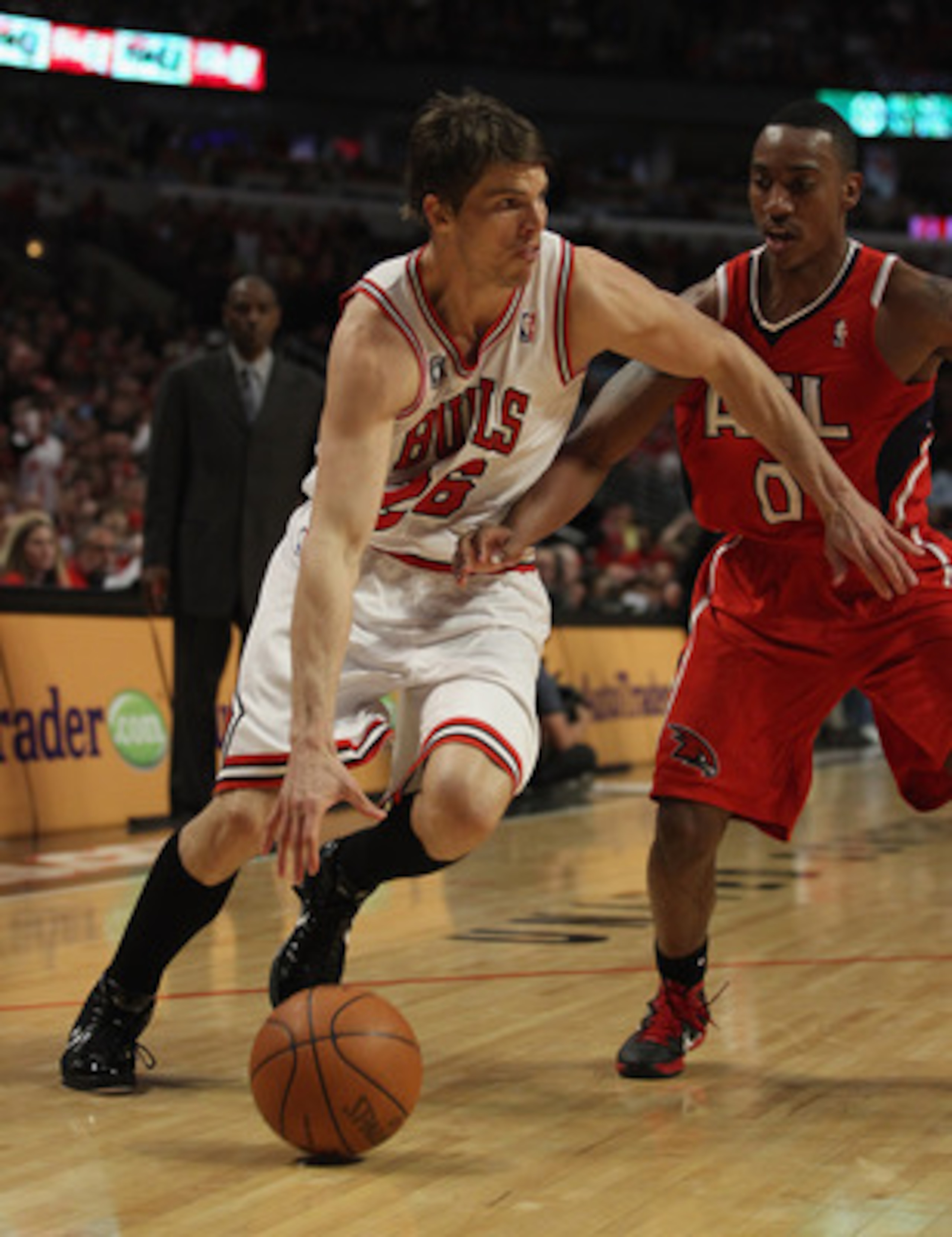 CHICAGO, IL - MAY 04: Kyle Korver #26 of the Chicago Bulls moves against Jeff Teague #0 of the Atlanta Hawks in Game Two of the Eastern Conference Semifinals in the 2011 NBA Playoffs at the United Center on May 4, 2011 in Chicago, Illinois. The Bulls defe