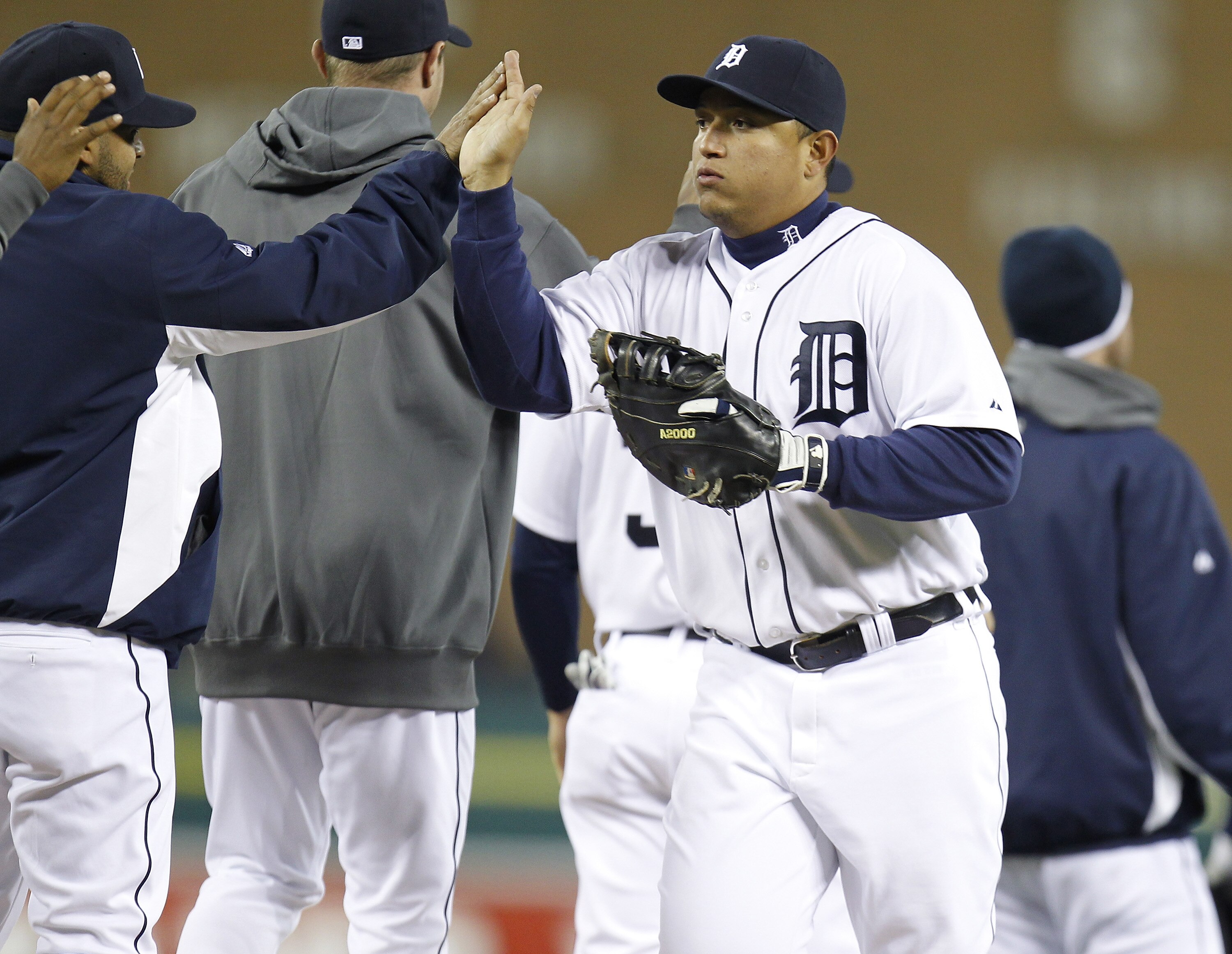 DETROIT, MI - MAY 03: Miguel Cabrera #24 of the Detroit Tigers celebrates a 4-2 victory over the New York Yankees with teammates at Comerica Park on May 3, 2011 in Detroit, Michigan. (Photo by Gregory Shamus/Getty Images)
