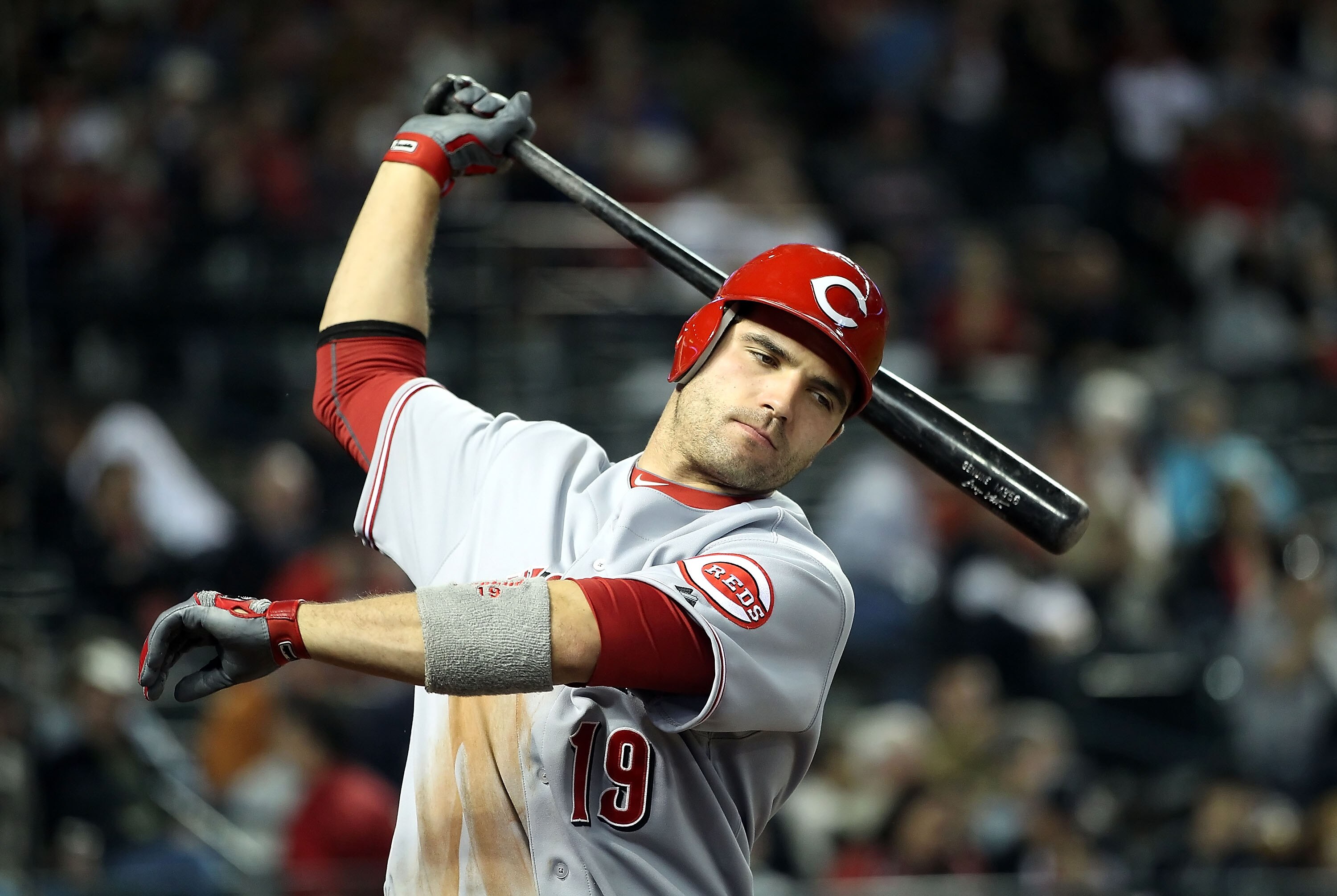 PHOENIX, AZ - APRIL 09:  Joey Votto #19 of the Cincinnati Reds warms up on deck during the Major League Baseball game against the Arizona Diamondbacks at Chase Field on April 9, 2011 in Phoenix, Arizona.  (Photo by Christian Petersen/Getty Images)
