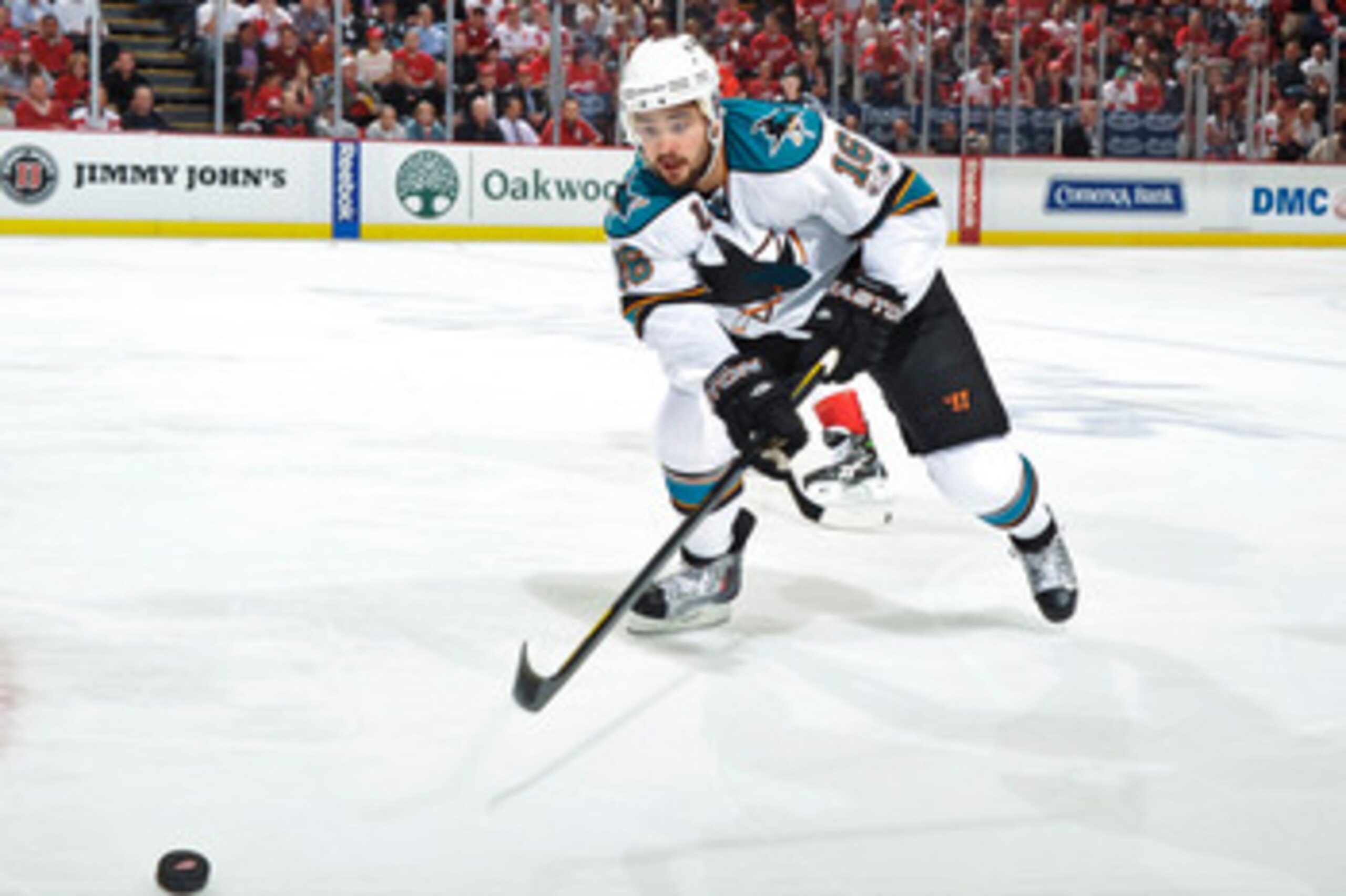 DETROIT - MAY 4: Devin Setoguchi #16 of the San Jose Sharks skates with the puck against the Detroit Red Wings in Game Three of the Western Conference Semifinals during the 2011 NHL Stanley Cup Playoffs on May 4, 2011 at Joe Louis Arena in Detroit, Michig