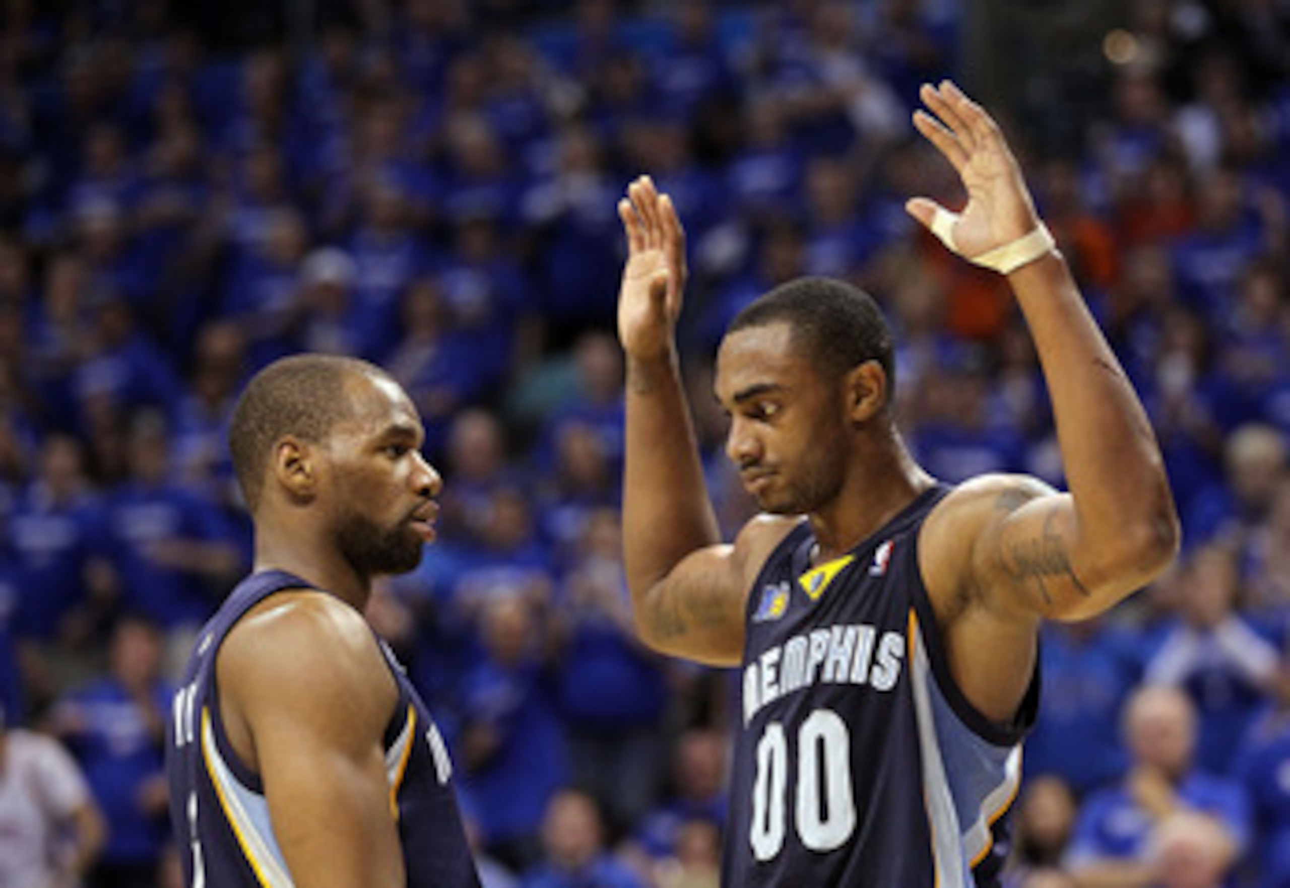 OKLAHOMA CITY, OK - MAY 03:  Forward Darrell Arthur #00 and Sam Young #4 of the Memphis Grizzlies reacts after a technical fou against of the Oklahoma City Thunder in Game Two of the Western Conference Semifinals in the 2011 NBA Playoffs on May 3, 2011 at