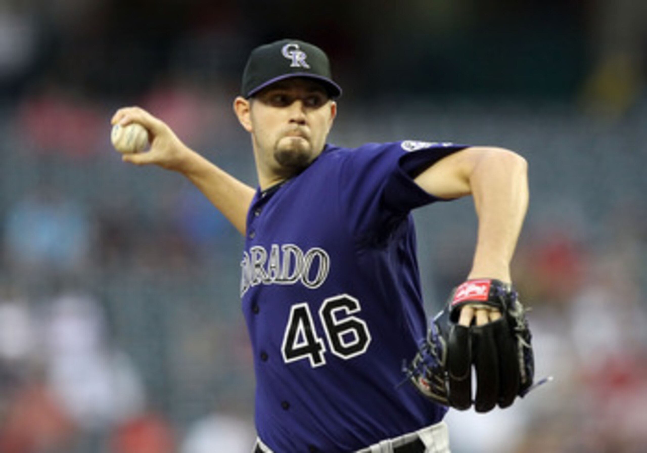 PHOENIX, AZ - MAY 05:  Starting pitcher Jason Hammel #46 of the Colorado Rockies pitches against the Arizona Diamondbacks during the Major League Baseball game at Chase Field on May 5, 2011 in Phoenix, Arizona.  (Photo by Christian Petersen/Getty Images)