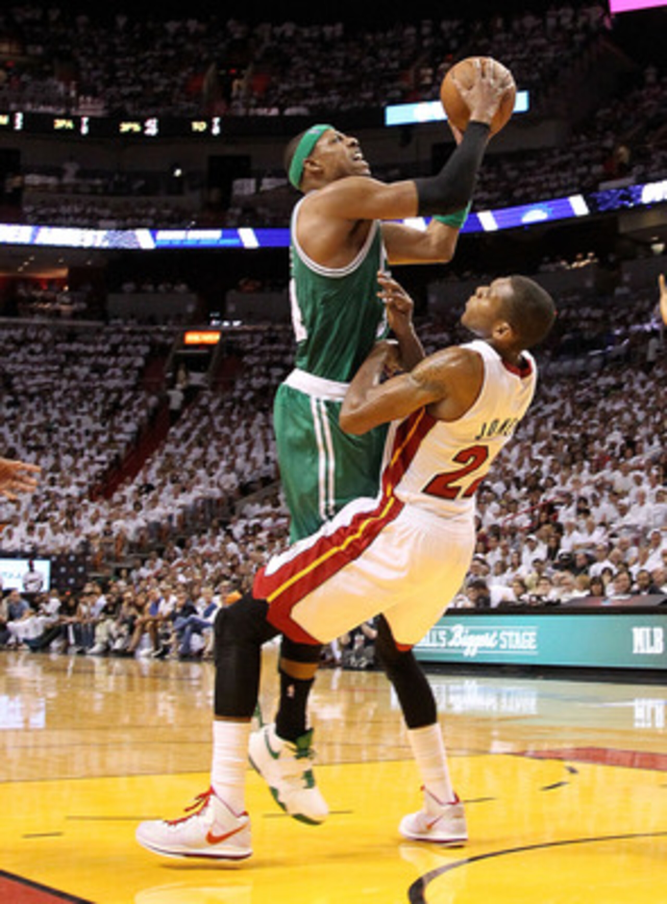 MIAMI, FL - MAY 01:  Paul Pierce #34 of the Boston Celtics shoots over James Jones #22 of the Miami Heat during Game One of the Eastern Conference Semifinals of the 2011 NBA Playoffs at American Airlines Arena on May 1, 2011 in Miami, Florida. NOTE TO USE