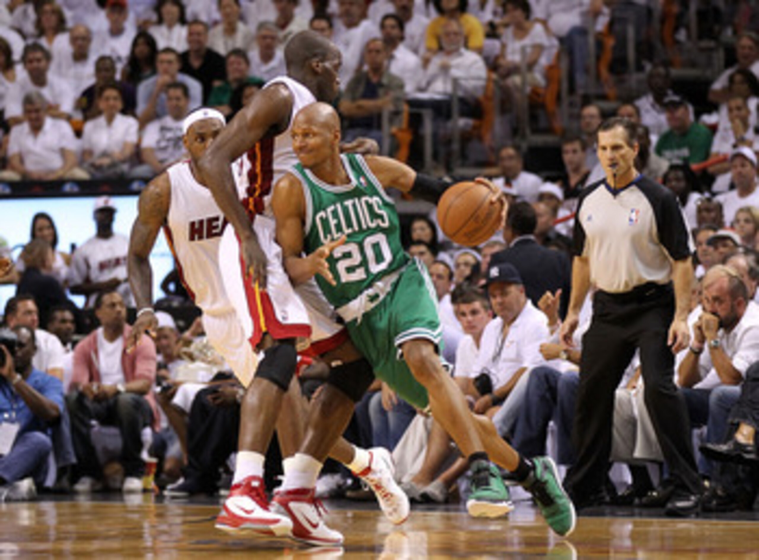 MIAMI, FL - MAY 03:  Ray Allen #20 of the Boston Celtics drive around Joel Anthony #50 of  the Miami Heat during Game Two of the Eastern Conference Semifinals of the 2011 NBA Playoffs at American Airlines Arena on May 3, 2011 in Miami, Florida. NOTE TO US