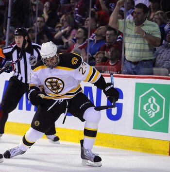 MONTREAL, QC - APRIL 21:  Jaroslav Spacek #6 of the Montreal Canadiens looks on as Chris Kelly #23 of the Boston Bruins celebrates his game tying goal late in the third period of Game Four of the Eastern Conference Quarterfinals during the 2011 NHL Stanle