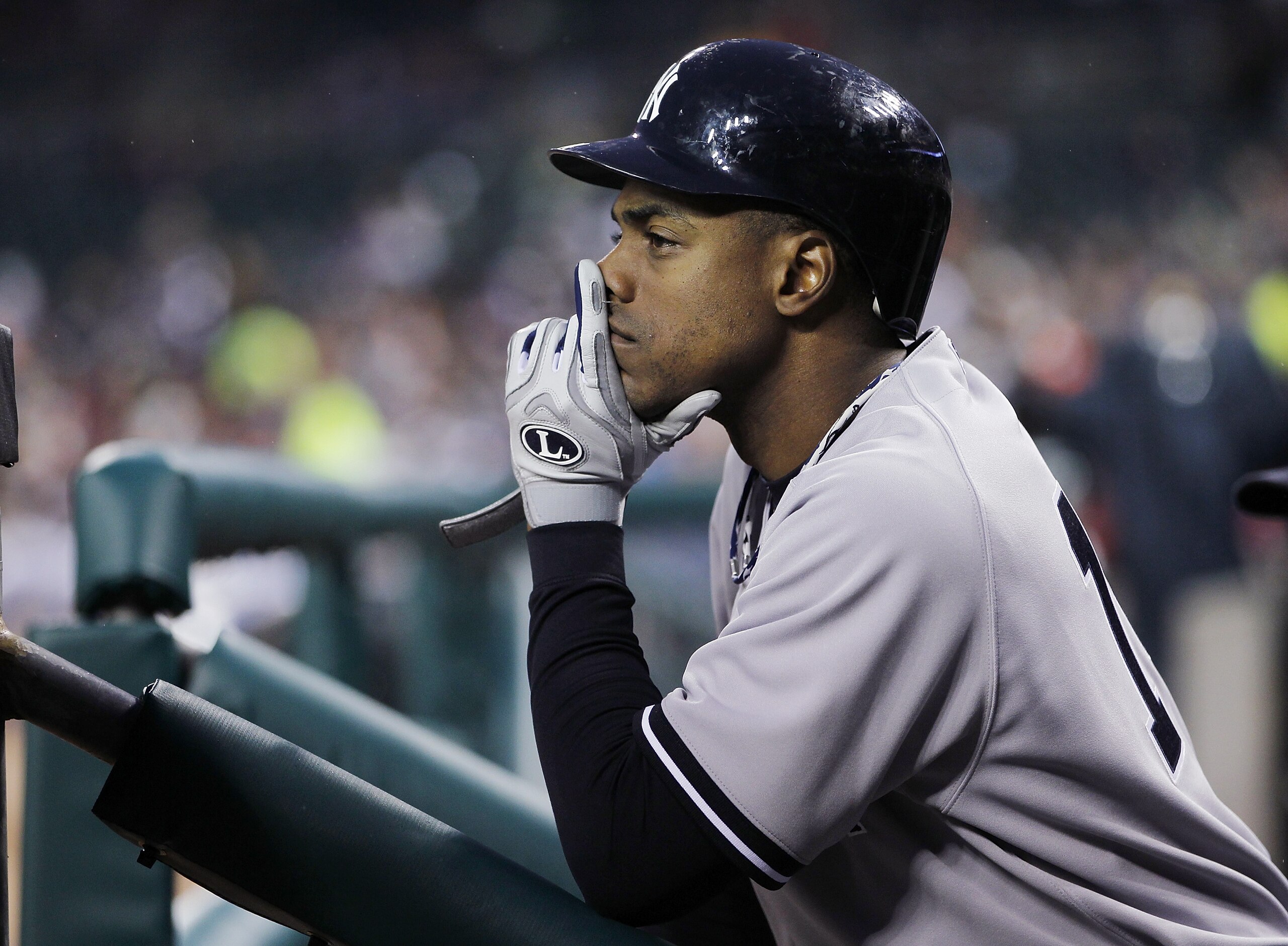 DETROIT, MI - MAY 03: Curtis Granderson #14 of the New York Yankees looks on from the dugout while playing the Detroit Tigers at Comerica Park on May 3, 2011 in Detroit, Michigan. Detroit won the game 4-2. (Photo by Gregory Shamus/Getty Images) DETROIT, MI - MAY 03: Curtis Granderson #14 of the New York Yankees looks on from the dugout while playing the Detroit Tigers at Comerica Park on May 3, 2011 in Detroit, Michigan. Detroit won the game 4-2. (Photo by Gregory Shamus/Getty Images)