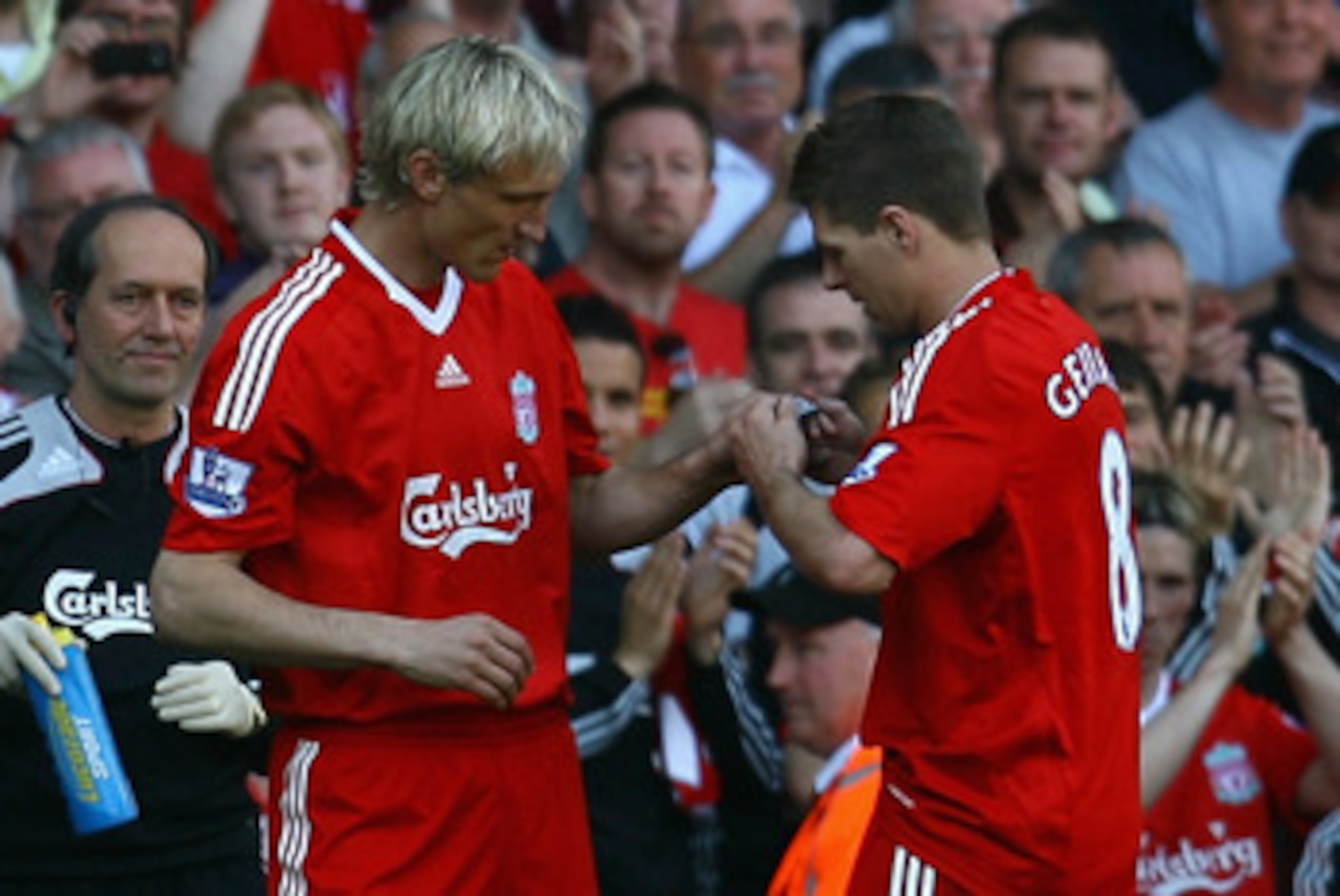 LIVERPOOL, ENGLAND - MAY 24:  Sami Hyypia of Liverpool replaces Steven Gerrard and is given the captain's armband during his last game for Liverpool in the Barclays  Premier League match between Liverpool and Tottenham Hotspur at Anfield on May 24, 2009 i