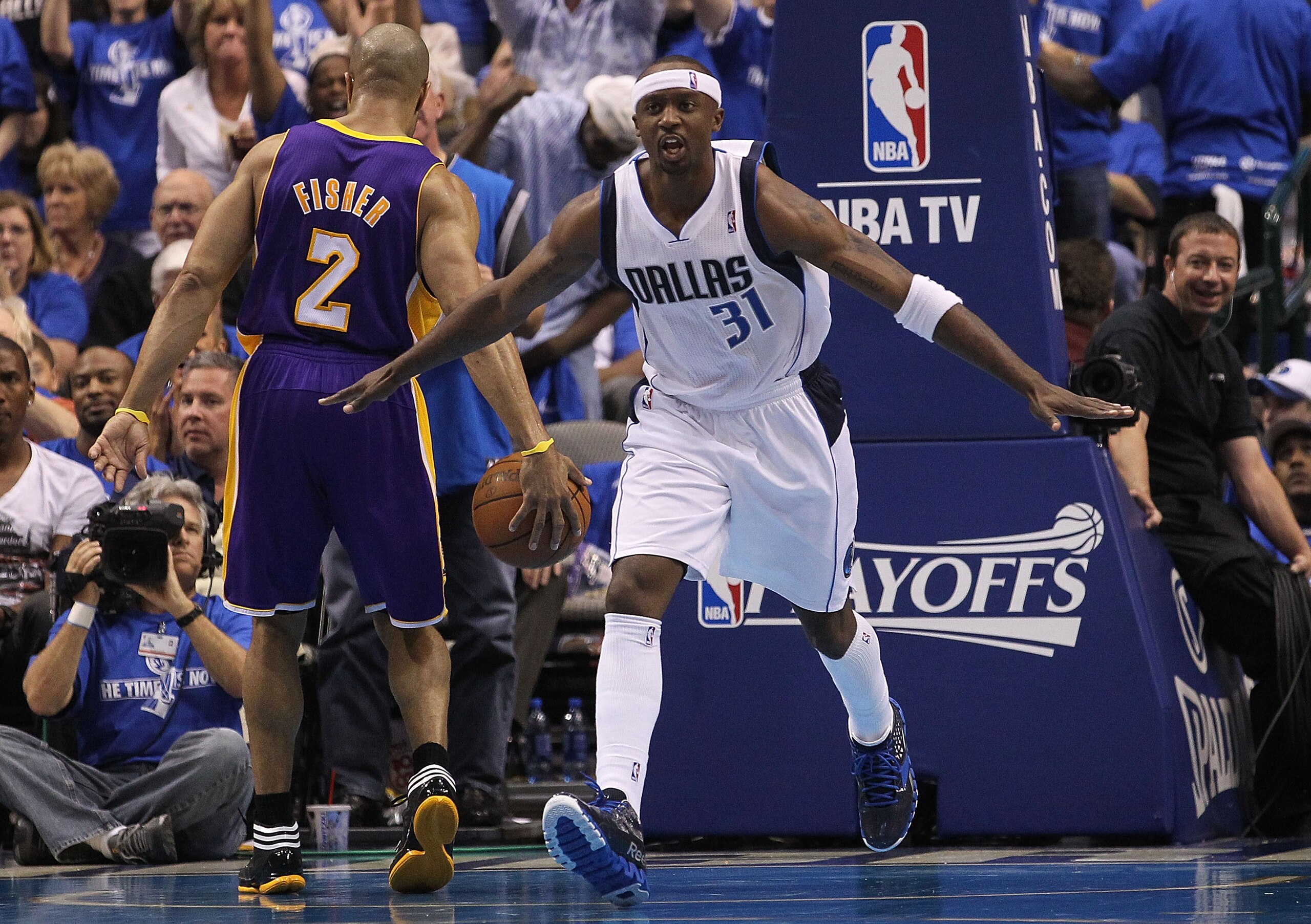 DALLAS, TX - MAY 06:  Guard Jason Terry #31 of the Dallas Mavericks reacts against Derek Fisher #2 of the Los Angeles Lakers in Game Three of the Western Conference Semifinals during the 2011 NBA Playoffs on May 6, 2011 at American Airlines Center in Dall