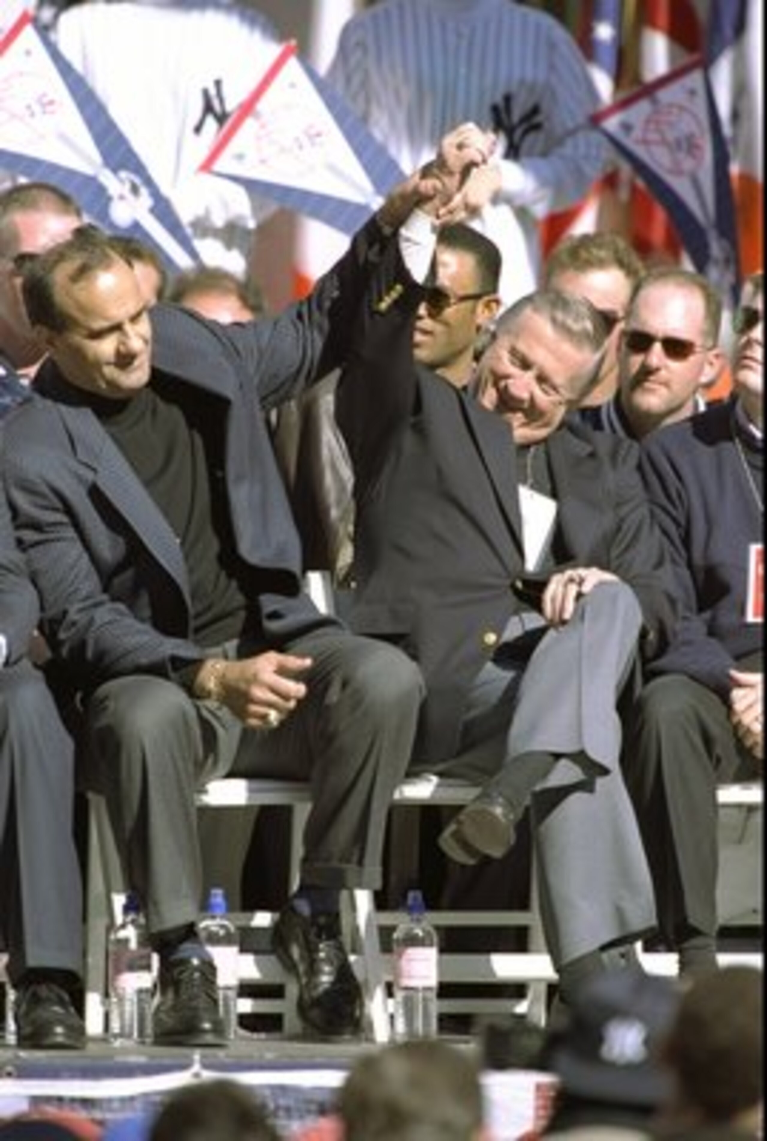 23 Oct 1998:  Manager Joe Torre and owner George Steinbrenner of the New York Yankees celebrate during a ticker-tape parade held after the Yankees defeated the San Diego Padres in four games to win the World Series in New York City, New York.